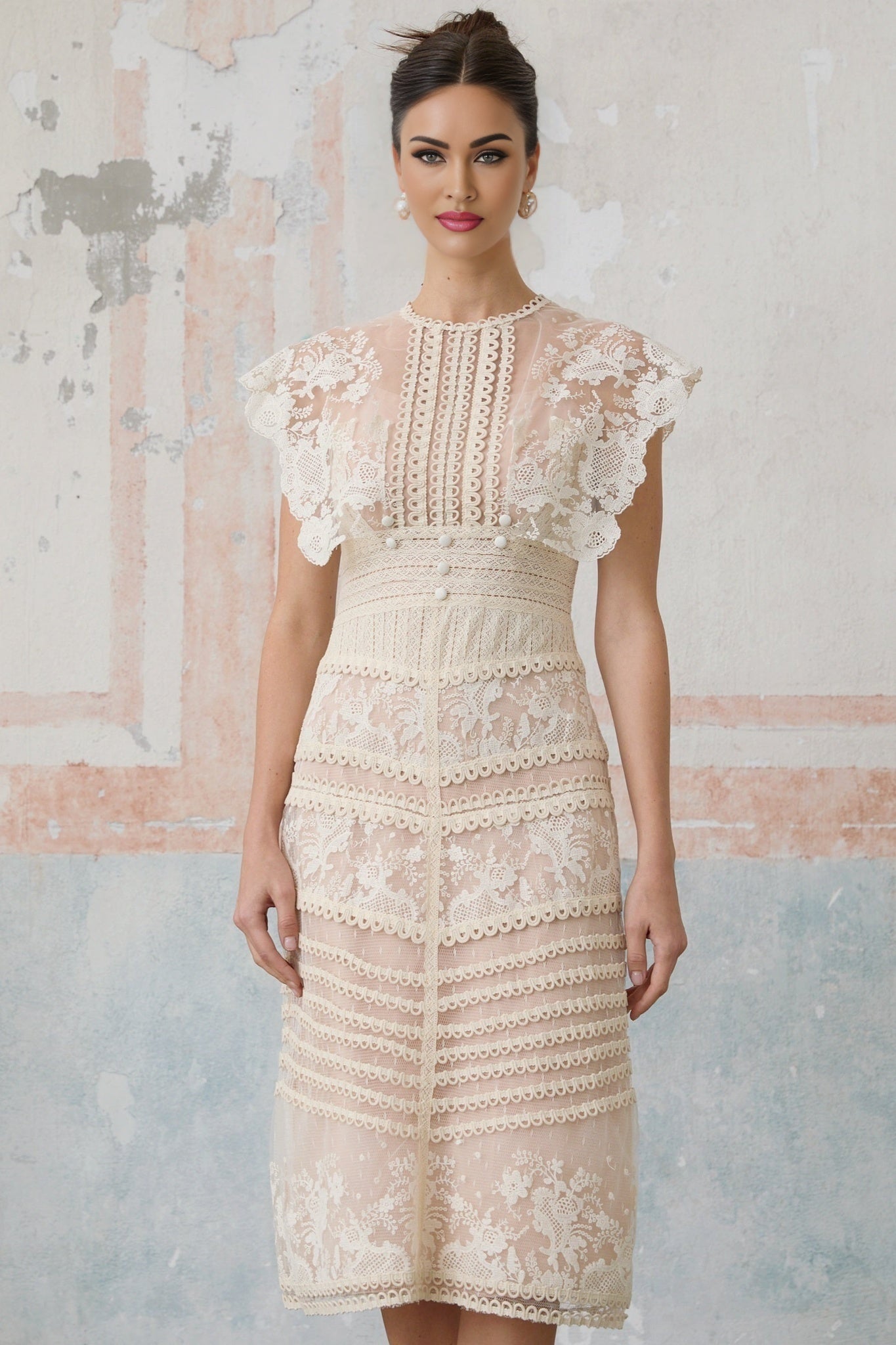 A beige midi dress with floral embroidery and lace detailing showcasing a delicate and feminine design