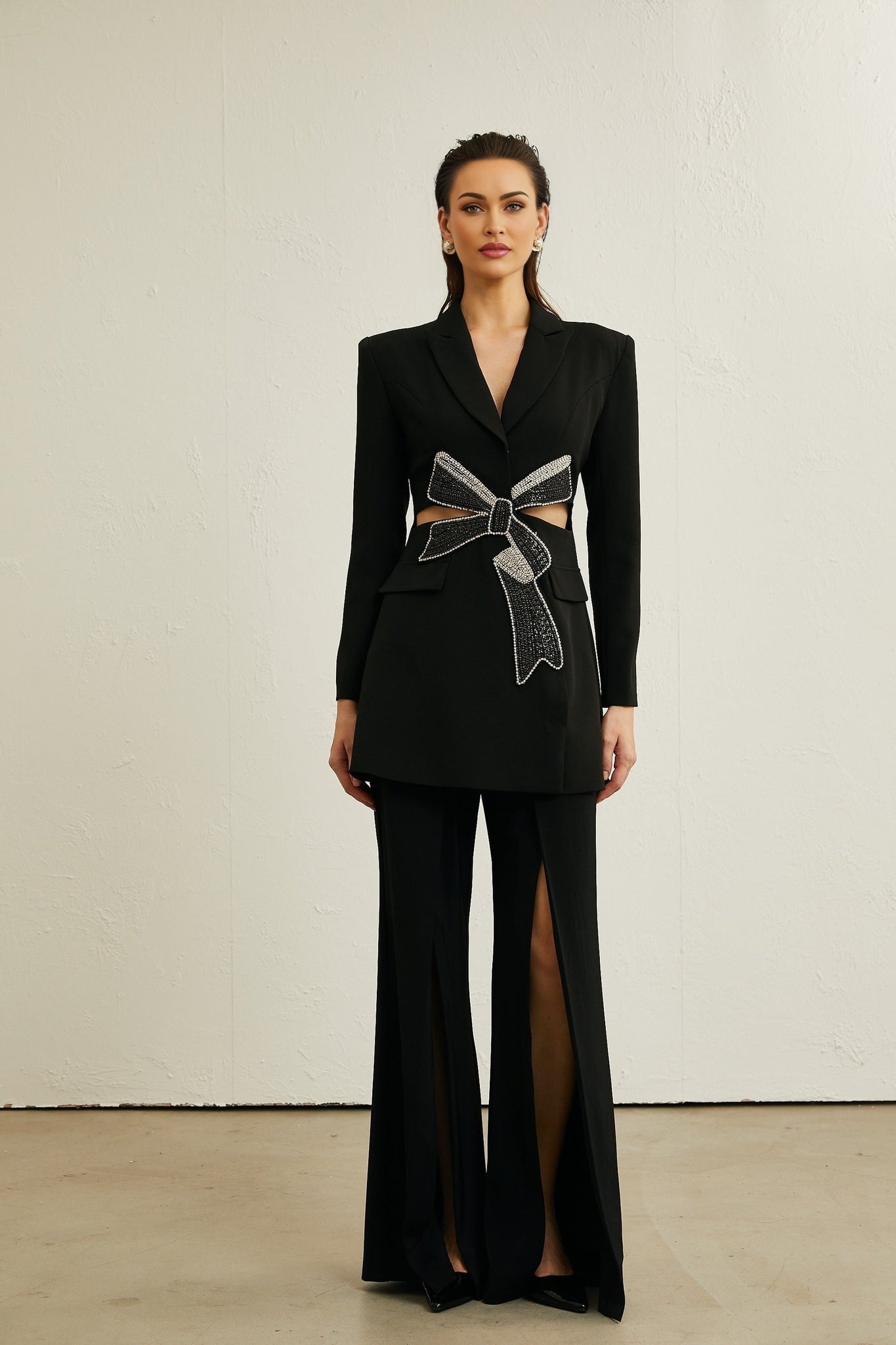 A black blazer with a bowknot detail and cutout design named Justine