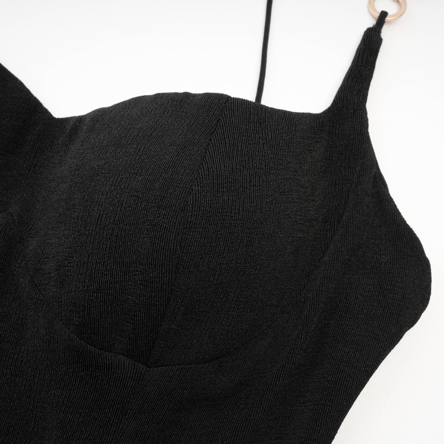A black bustier midi dress called Ailbhe featuring a fitted bodice and flowing skirt