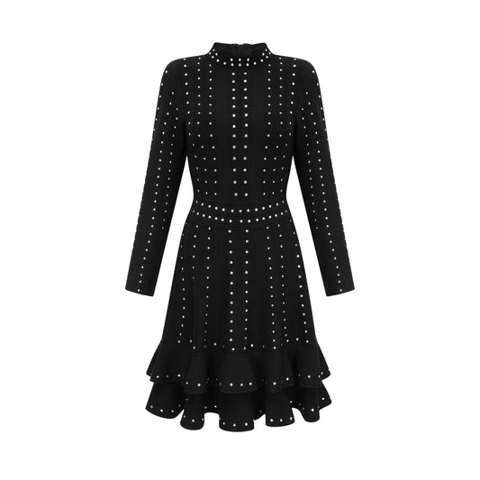 A black knitted mini dress with ruffled details and embellishments named Fabienne