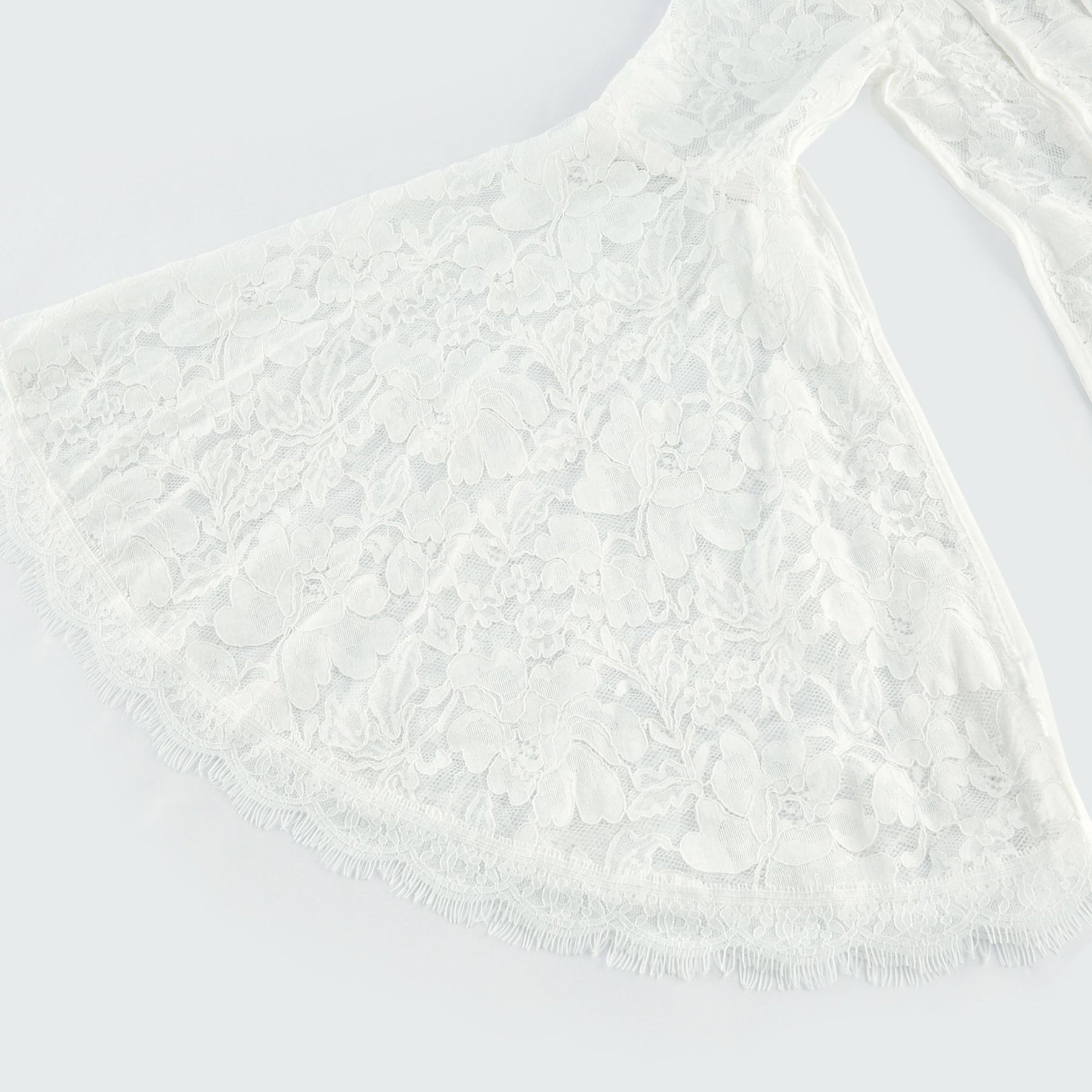 A black lace midi dress with cutout details by Celine