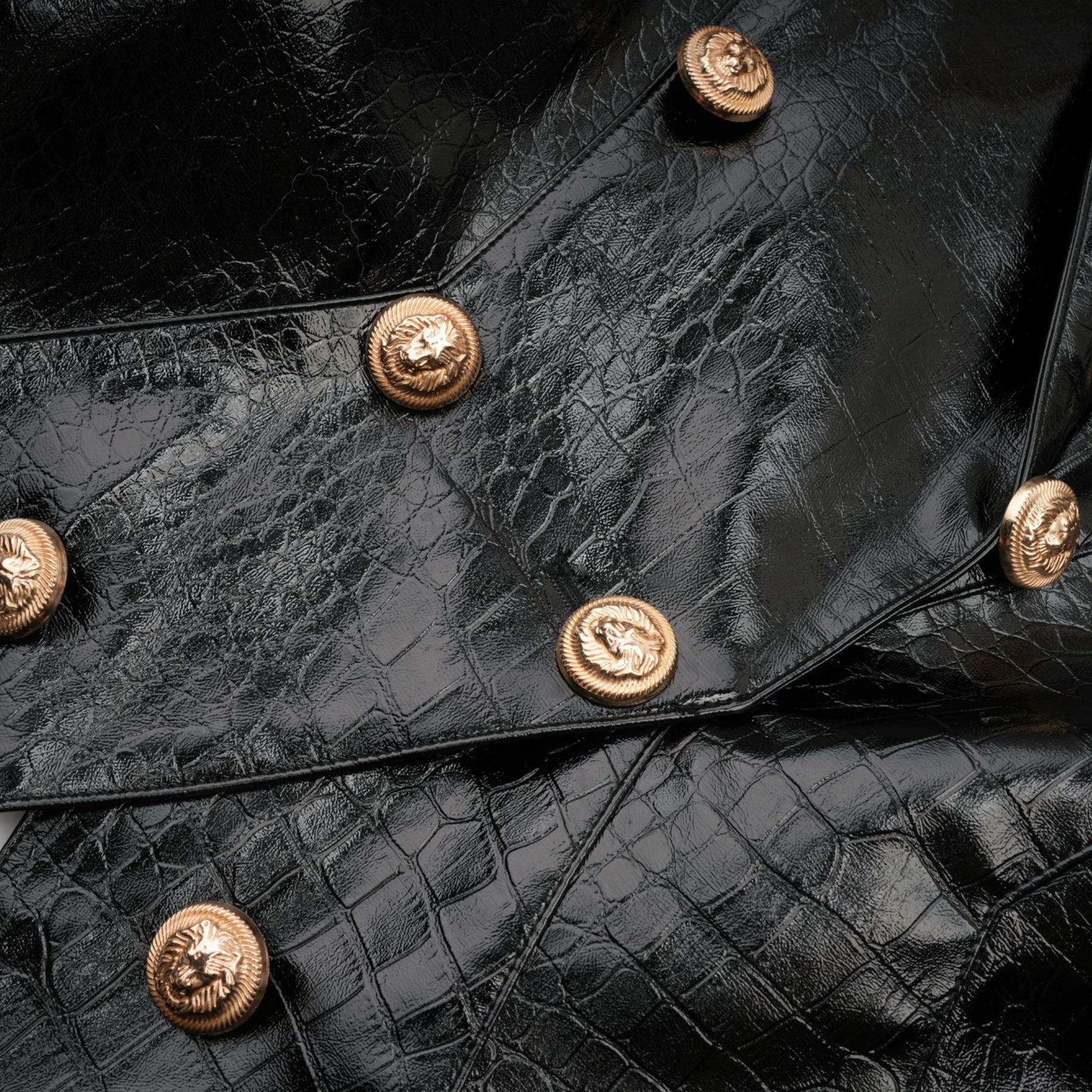 A black leather jacket with a cinched waist design named Elodie