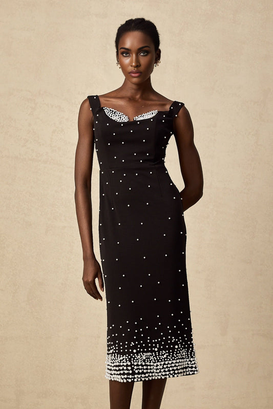 A black midi dress with faux pearl embellishments named Apolline