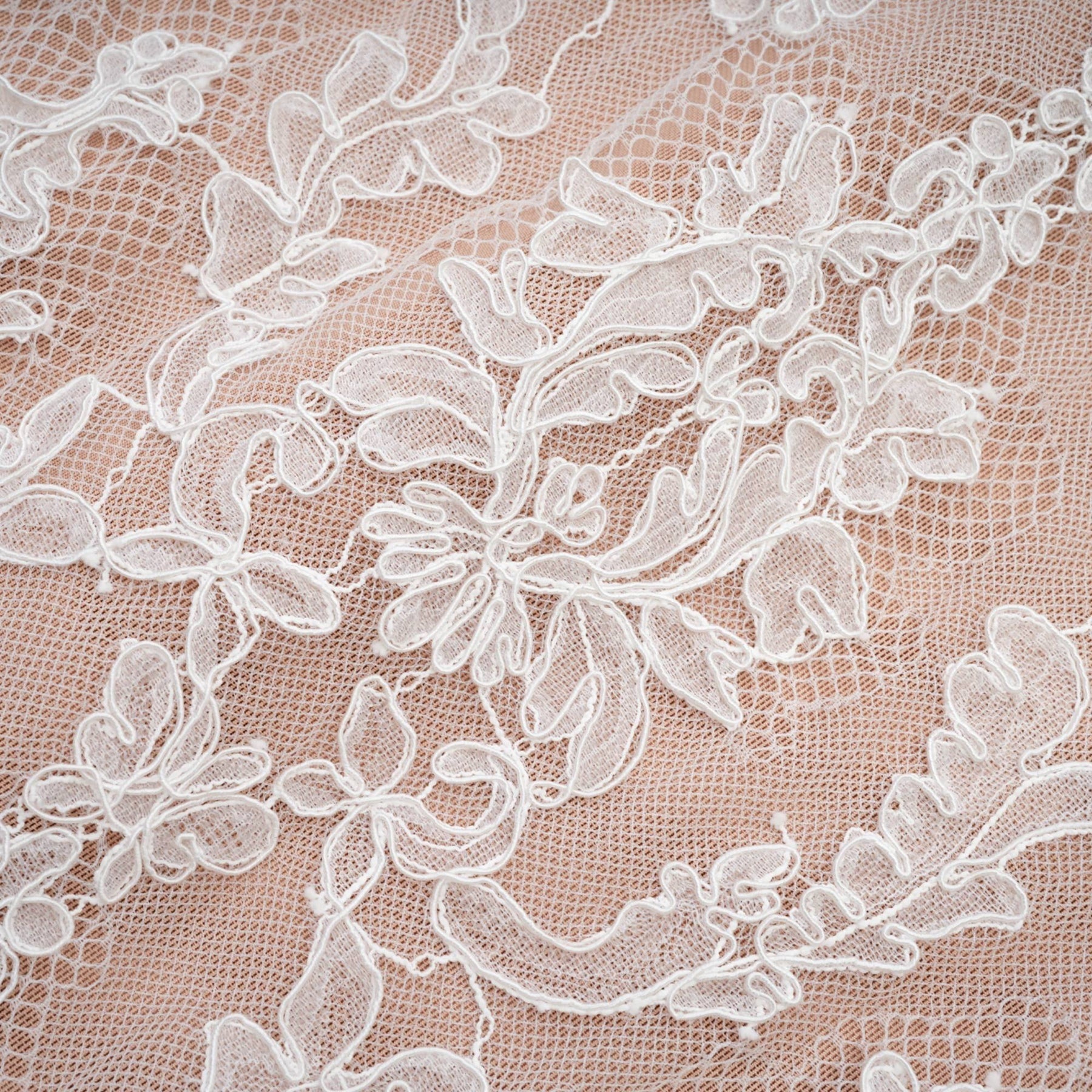 A black midlength bandage dress with a bustier style top featuring a strapless design and form fitting silhouette