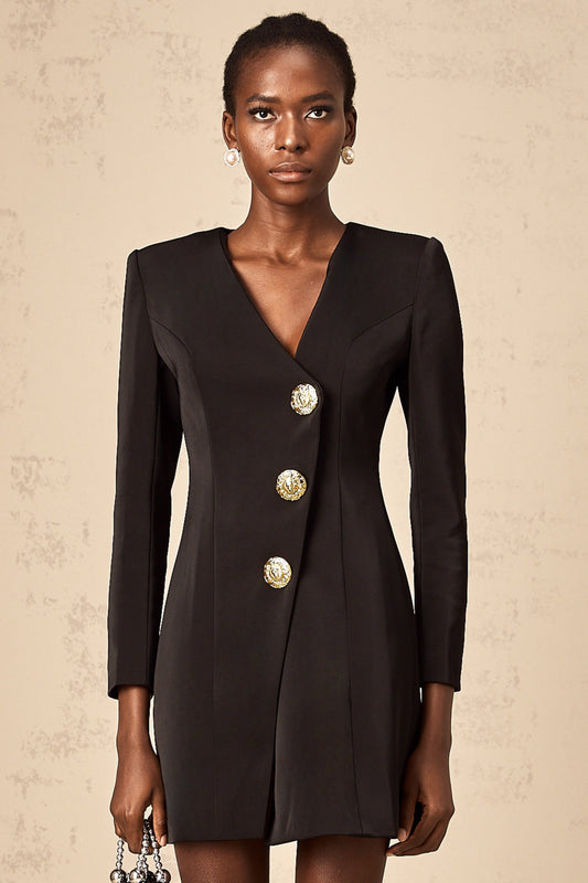 A black mini dress with a blazerstyle top featuring decorative lion head details on the shoulders or lapels