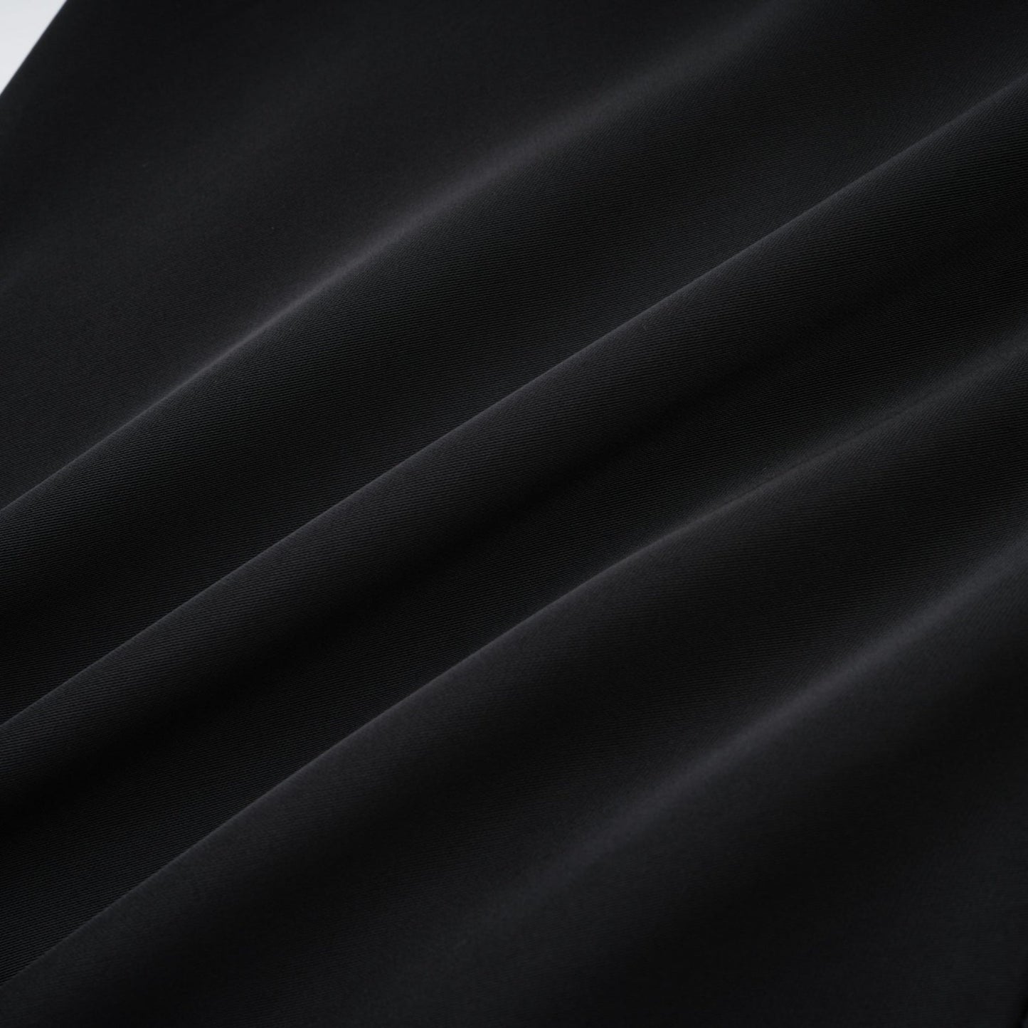 Black sleeveless dress with spaghetti straps square neck draped design rear zip fastening and mini length in 80% Polyester 20% Cotton composition