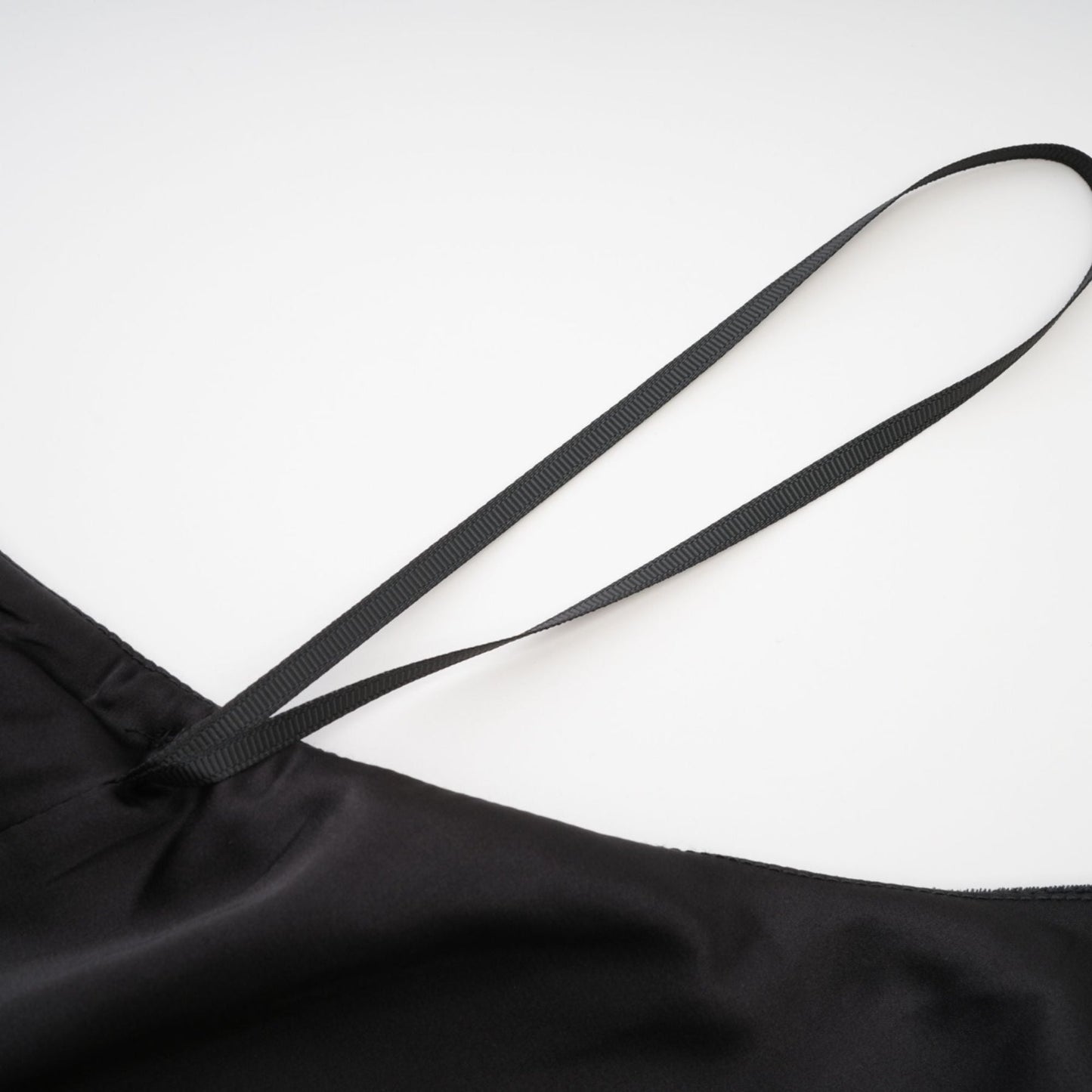 Embellished black dress with crystal turtle neck sleeveless ankle length rear zip and side slit Made of 100% Polyester