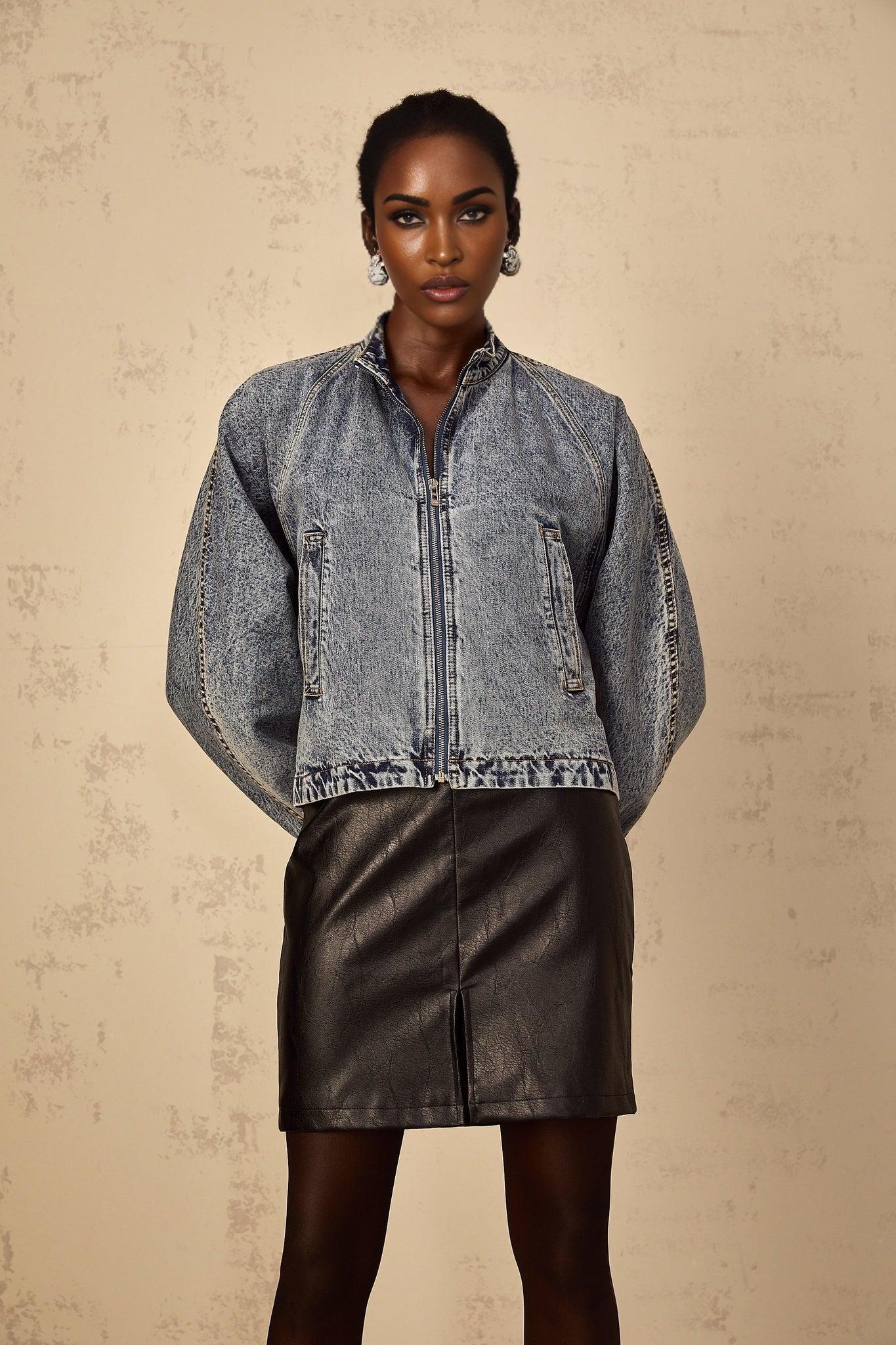 A blue denim jacket with whiskering details named Isidore