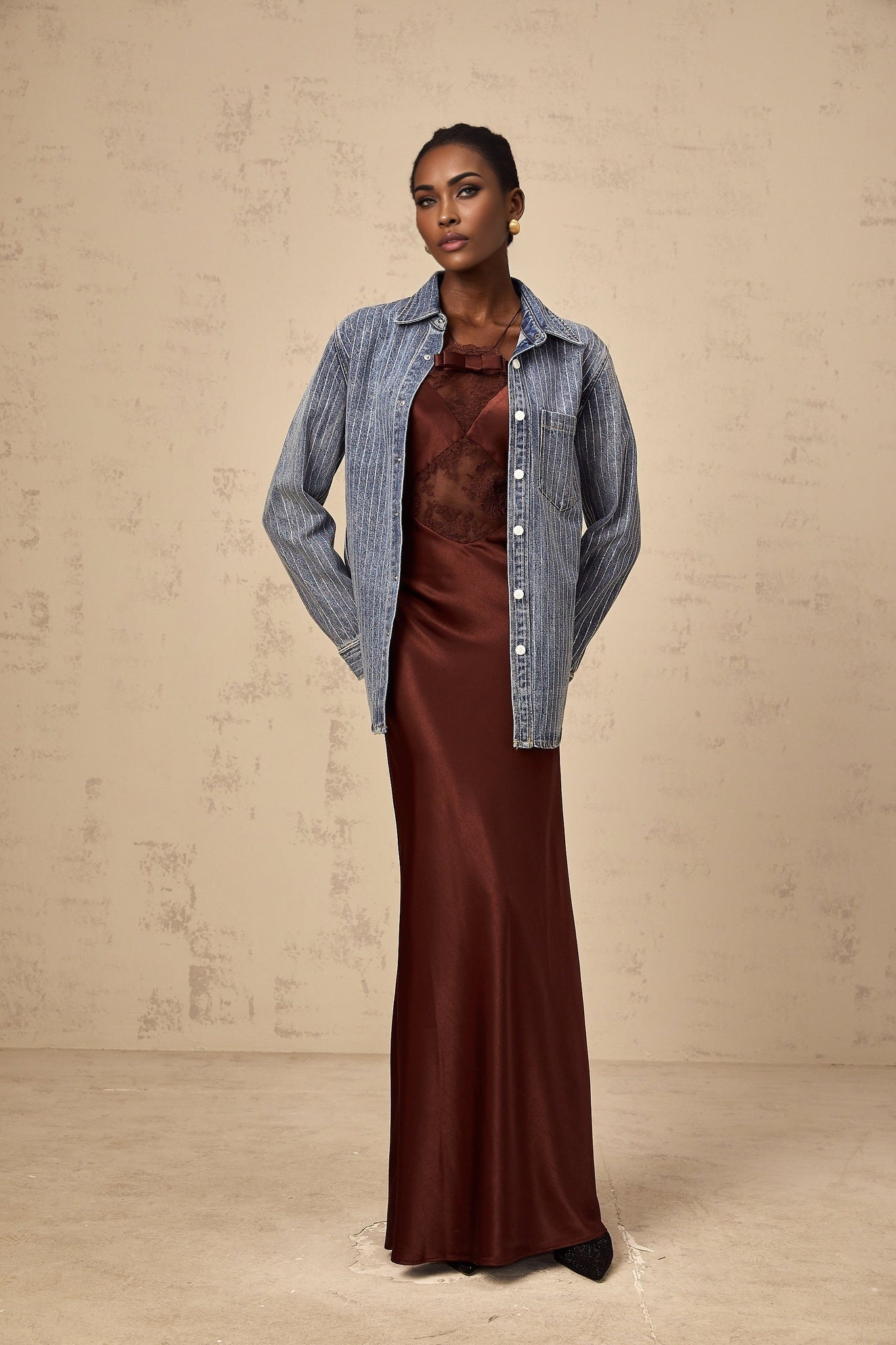 A blue denim shirt with vertical stripes and embellishments called Josephine