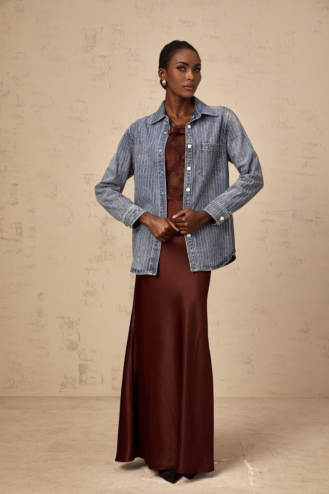 A blue denim shirt with vertical stripes and embellishments named Josephine
