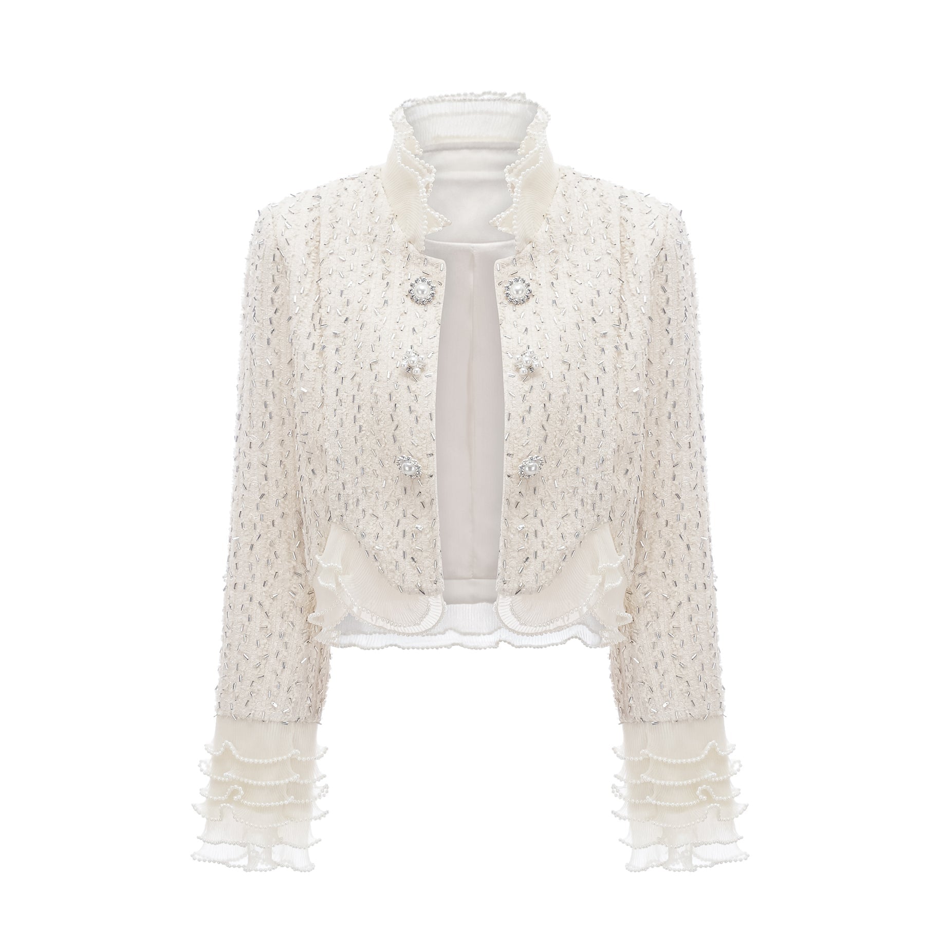 A cropped white jacket with beaded embellishments and ruffle details named Blanche