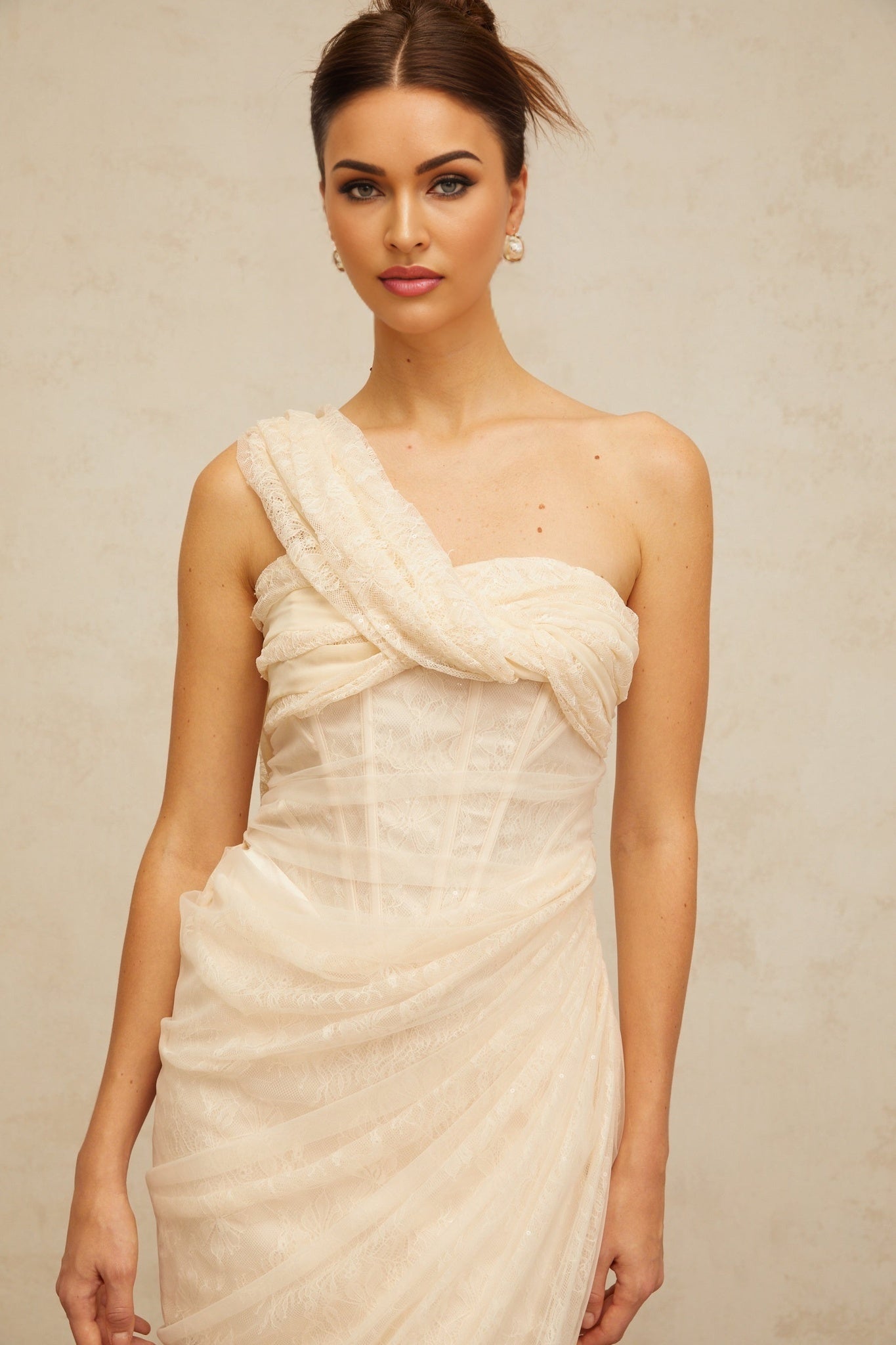 A floral lace midi dress with gathered tulle panels named Petunia featuring a delicate floral pattern and a feminine silhouette