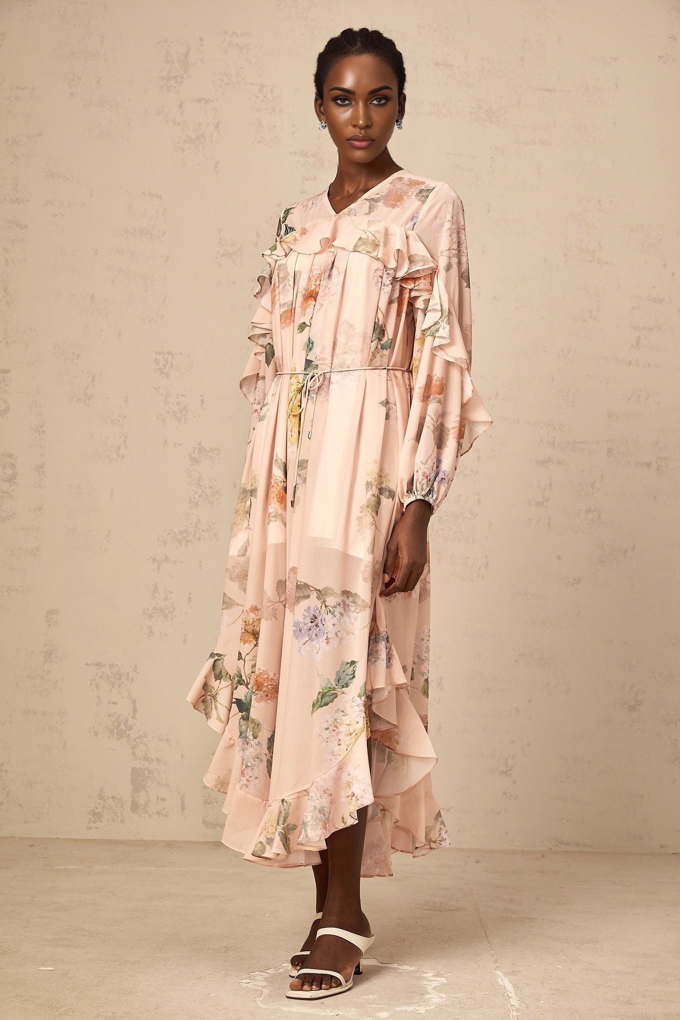 A floral patterned midi dress with ruffled trim details named Patricia