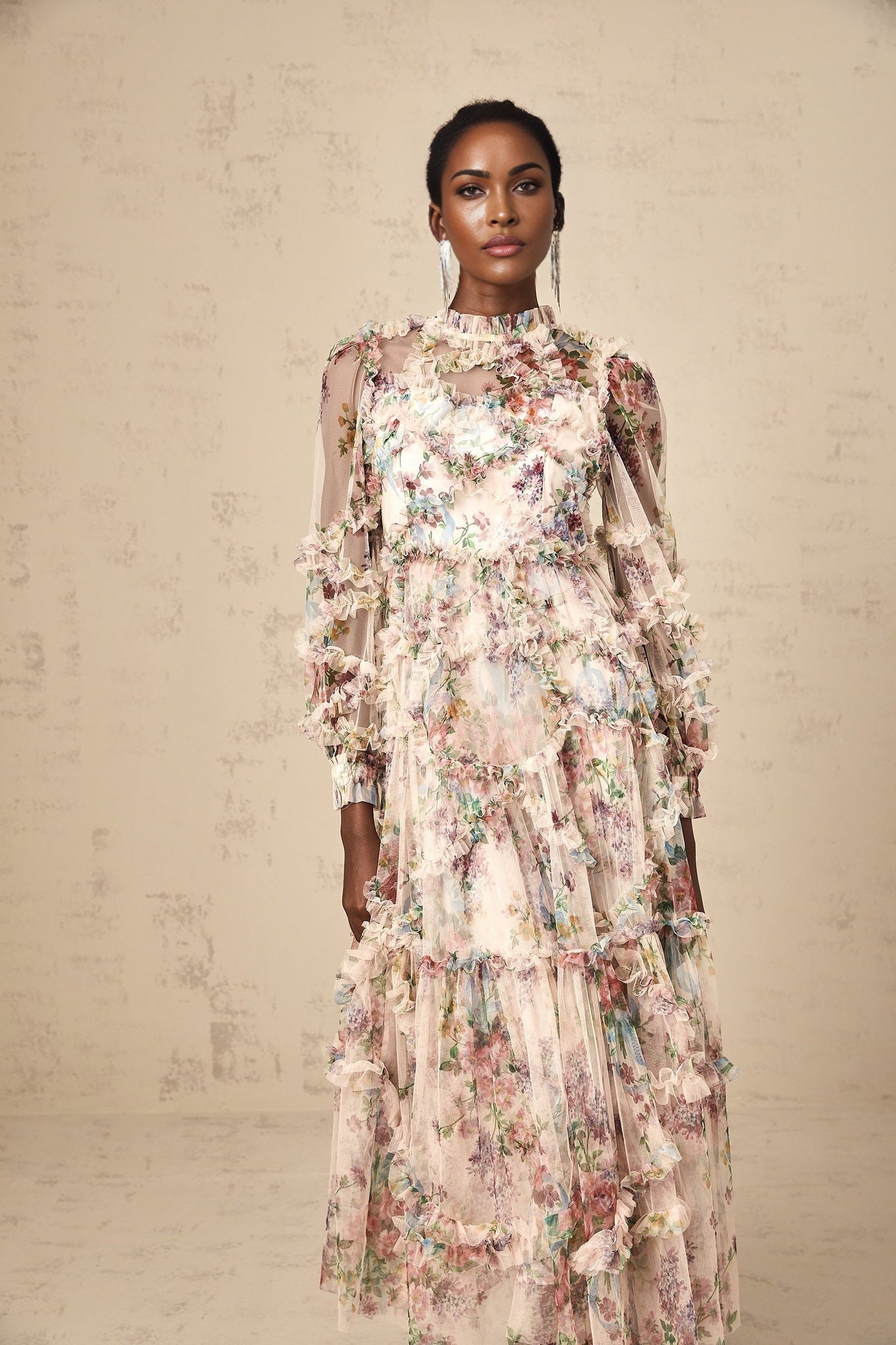 A floral patterned tulle midi dress with ruffled details named Candice featuring a delicate feminine design