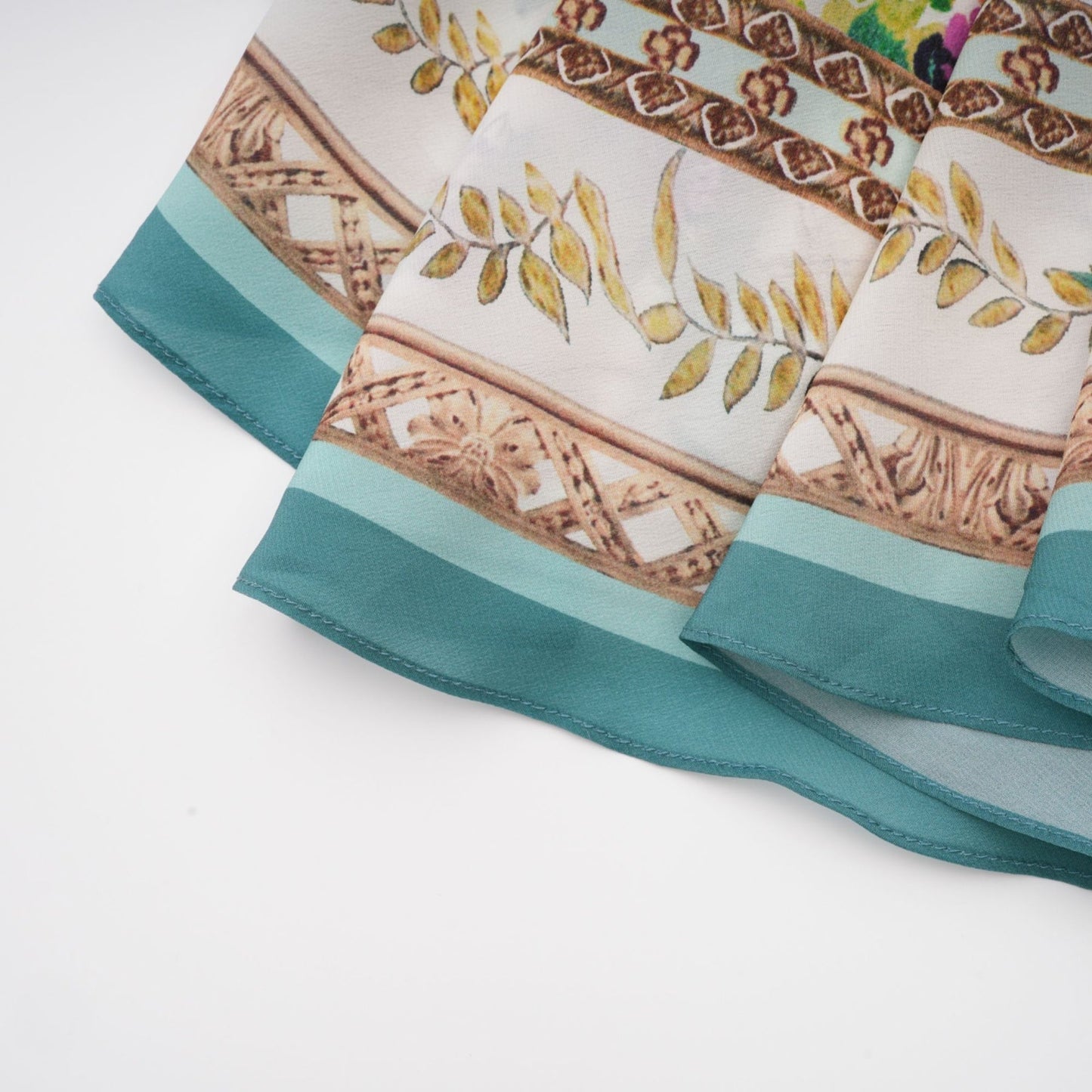 A floral print midi dress with Philippineinspired design featuring decorative embellishments and a colorful floral pattern on a light background