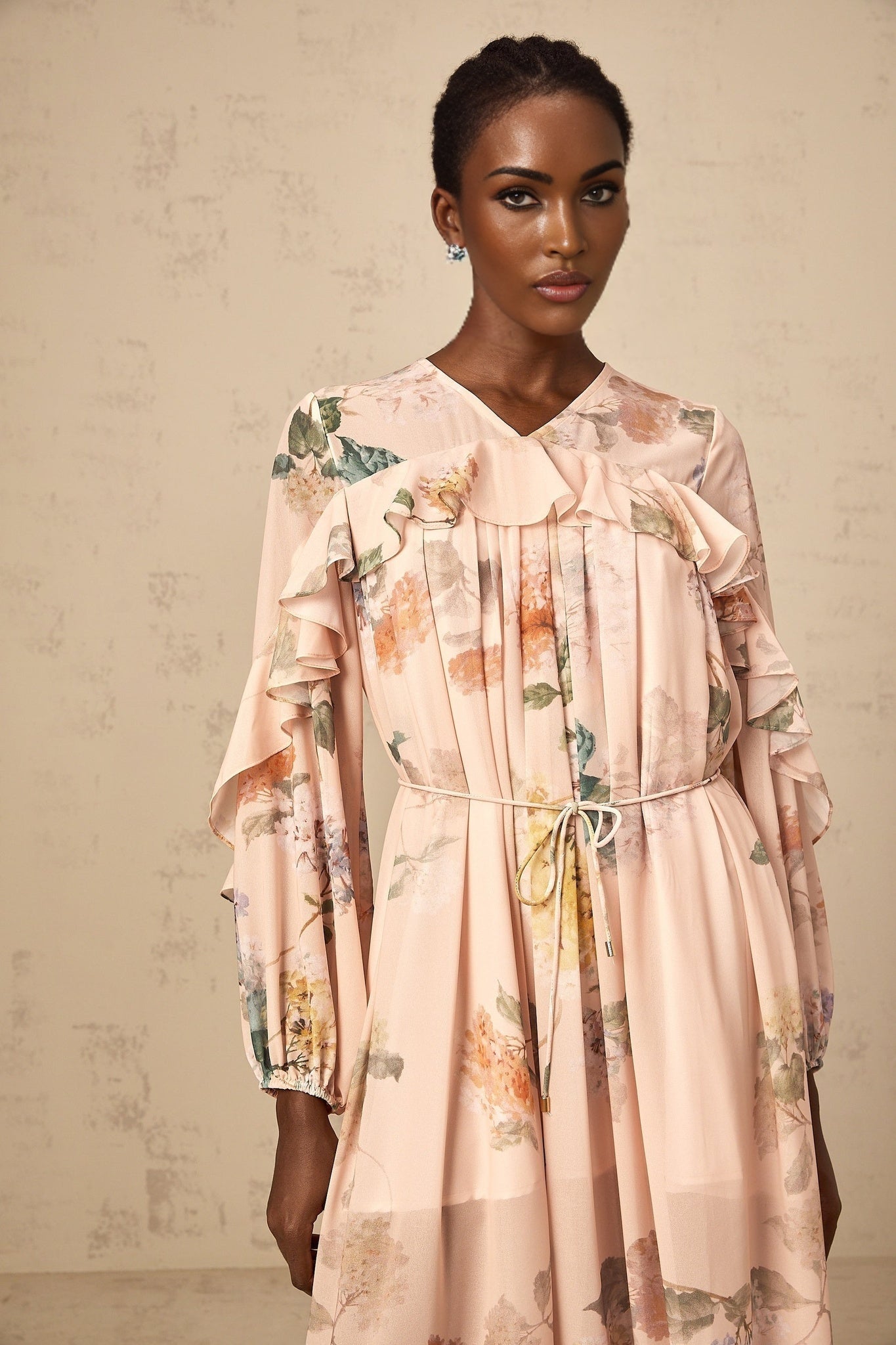 A floral print midi dress with ruffled trim details named Patricia featuring a feminine design and midlength hemline