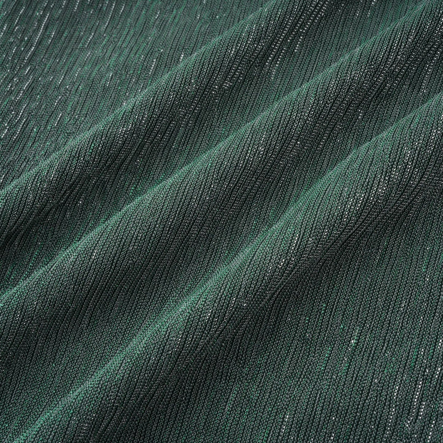 A green maxi dress with a corsetstyle bodice featuring ribbon detailing and a flowing long skirt