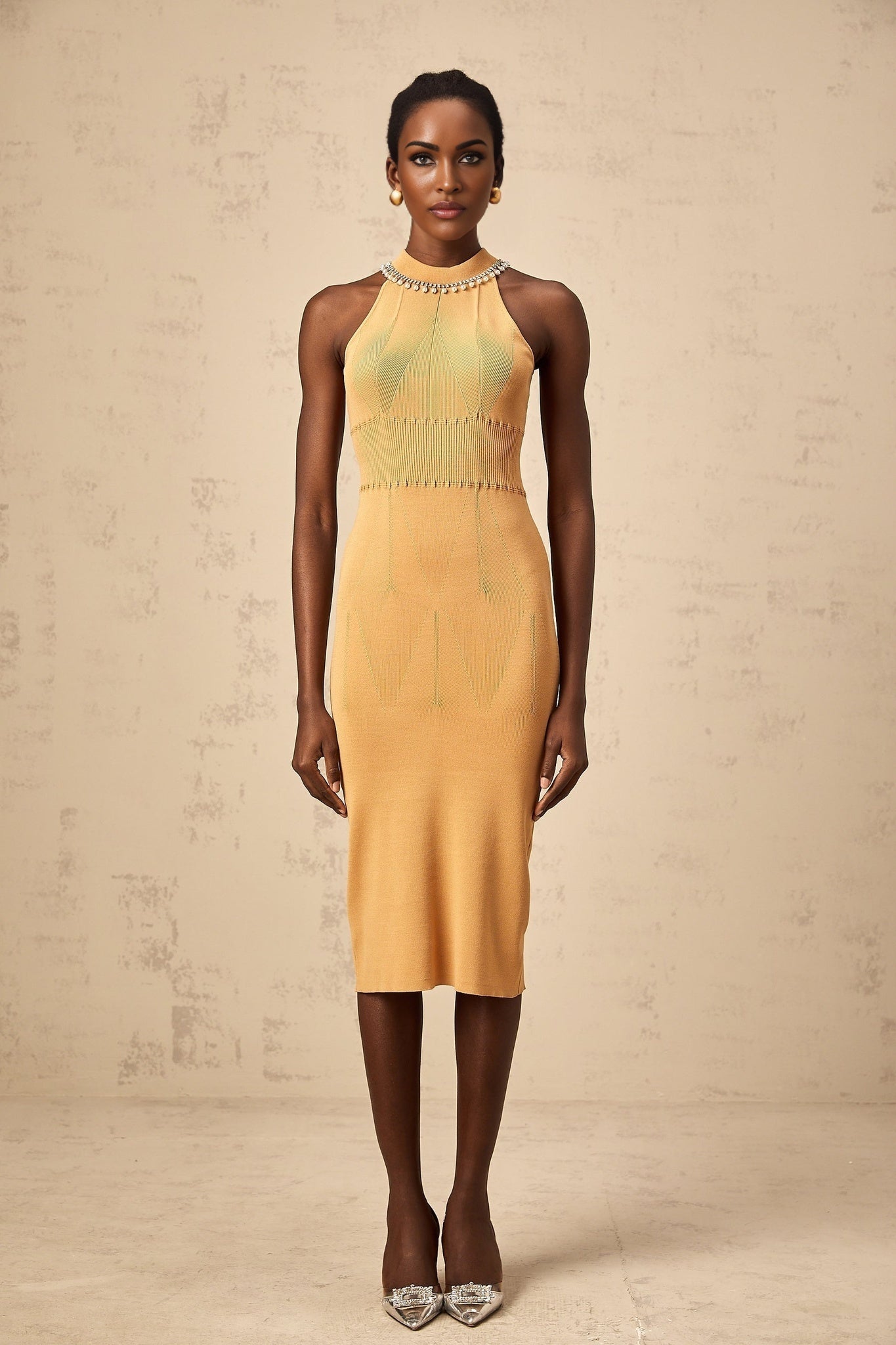 A knit midi dress with faux pearl embellishments called Juliette