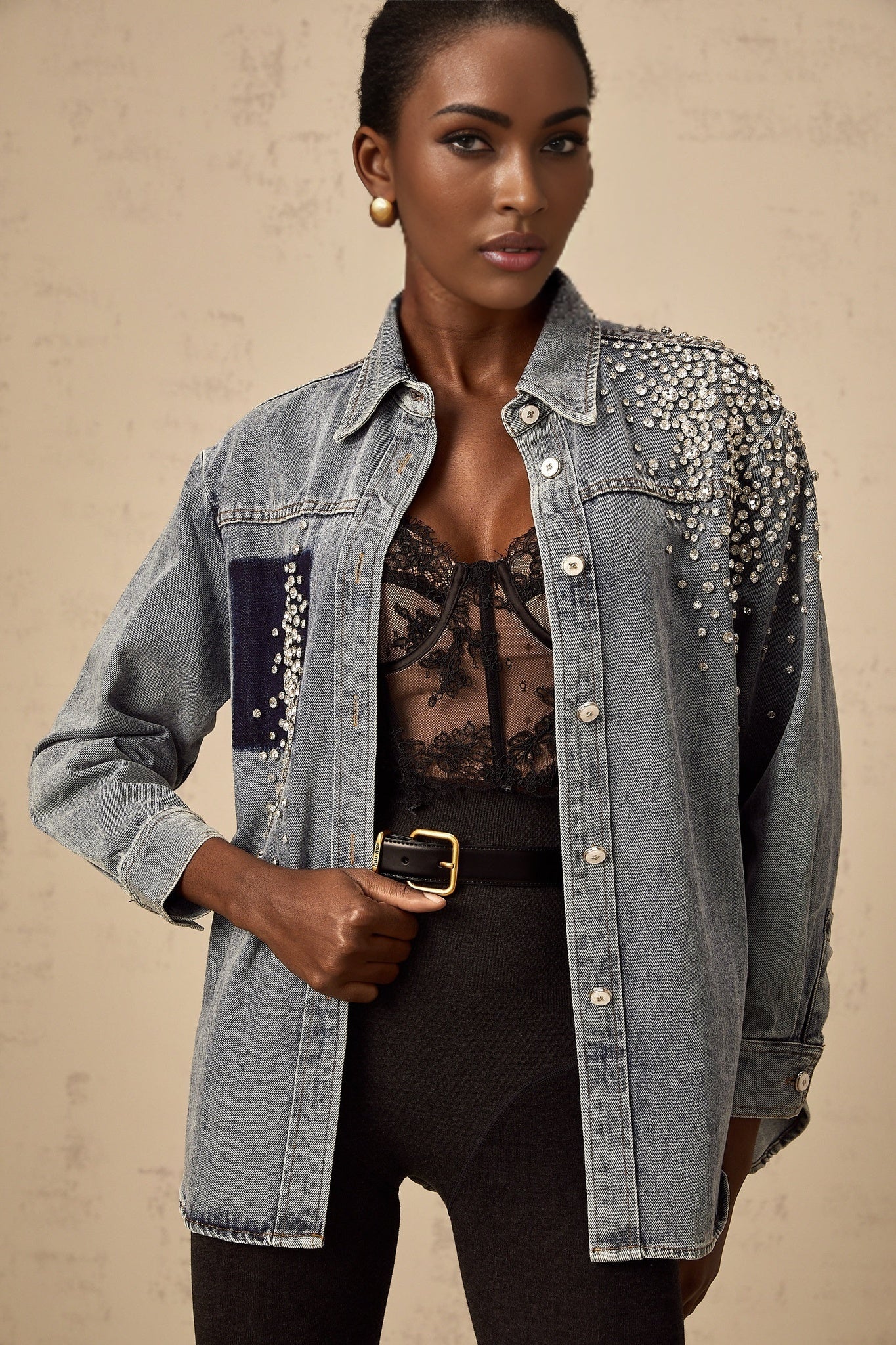 A light blue denim shirt with rhinestone embellishments scattered across the fabric named Segolene
