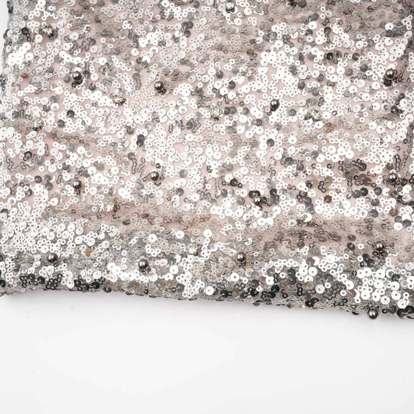 A long asymmetric maxi dress with sequin embellishments named Juliette featuring a flowing silhouette and sparkling details