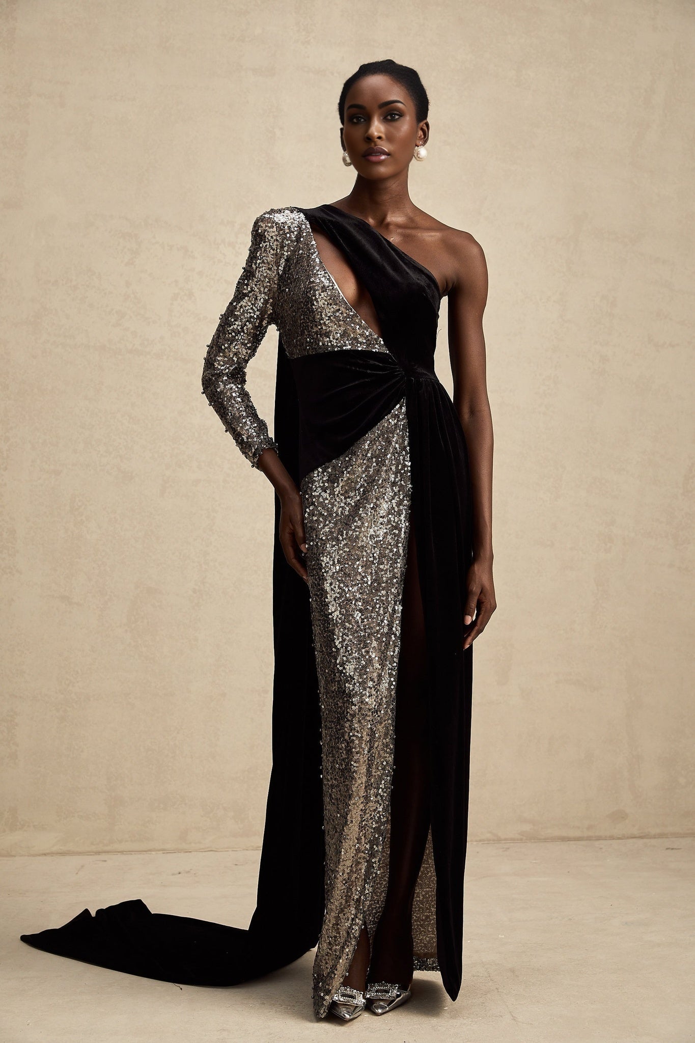A long asymmetric maxi dress with sequin embellishments named Juliette featuring a sleek silhouette and sparkling details