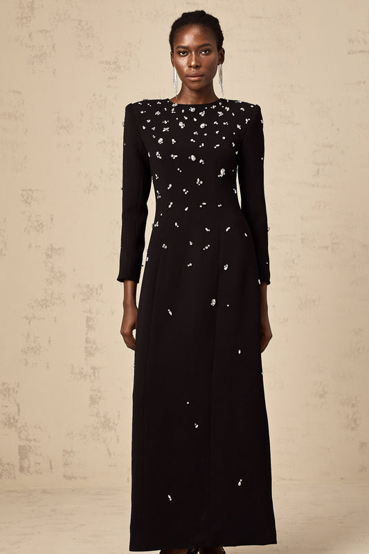 A long black maxi dress adorned with sparkling crystal embellishments elegant formal evening gown
