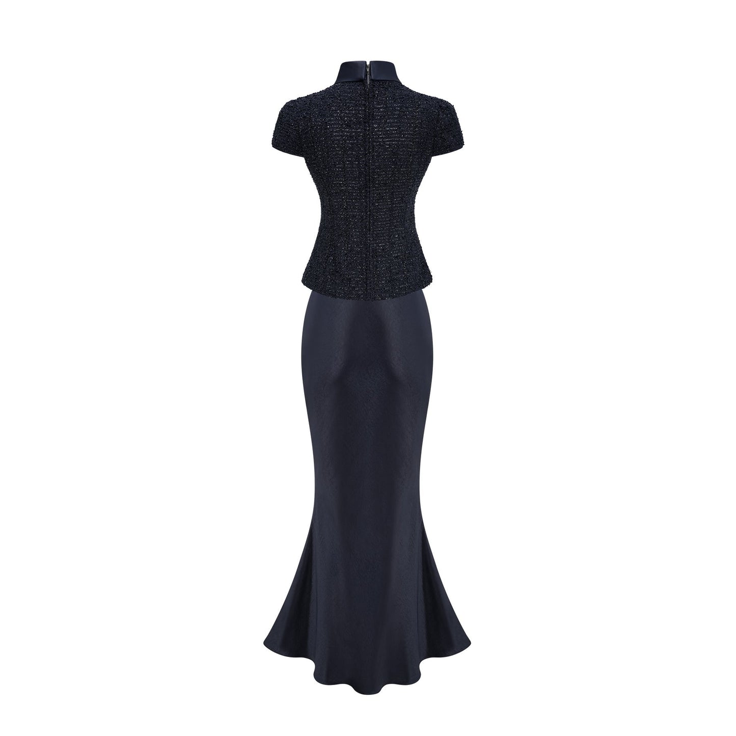 A long blue maxi dress with a fitted peplum waist and panelled design featuring a flowing skirt and feminine silhouette