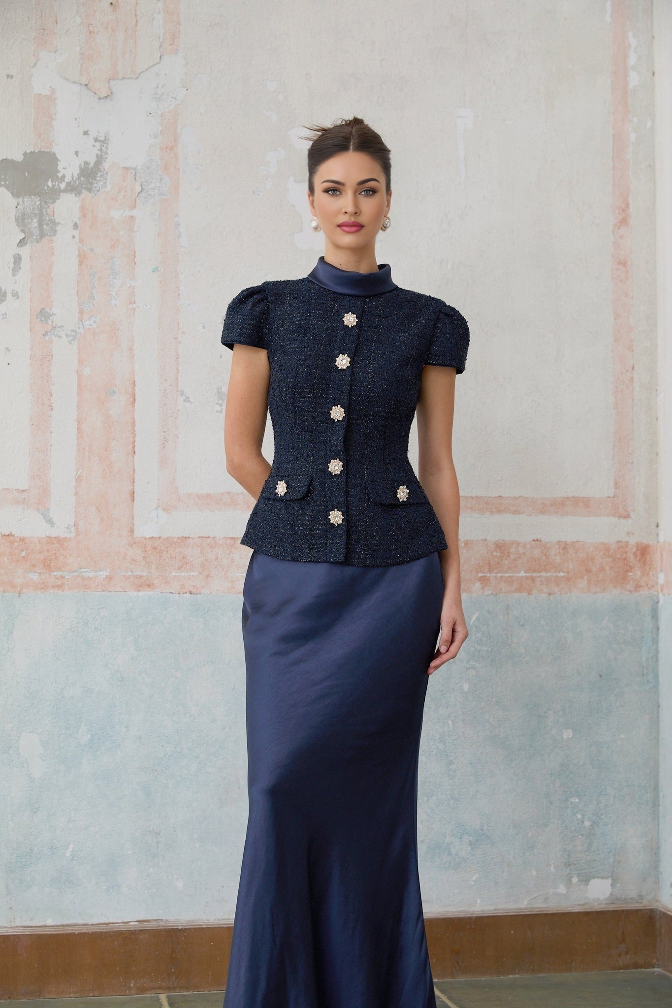 A long blue maxi dress with a peplum waist and panelled design named Josette
