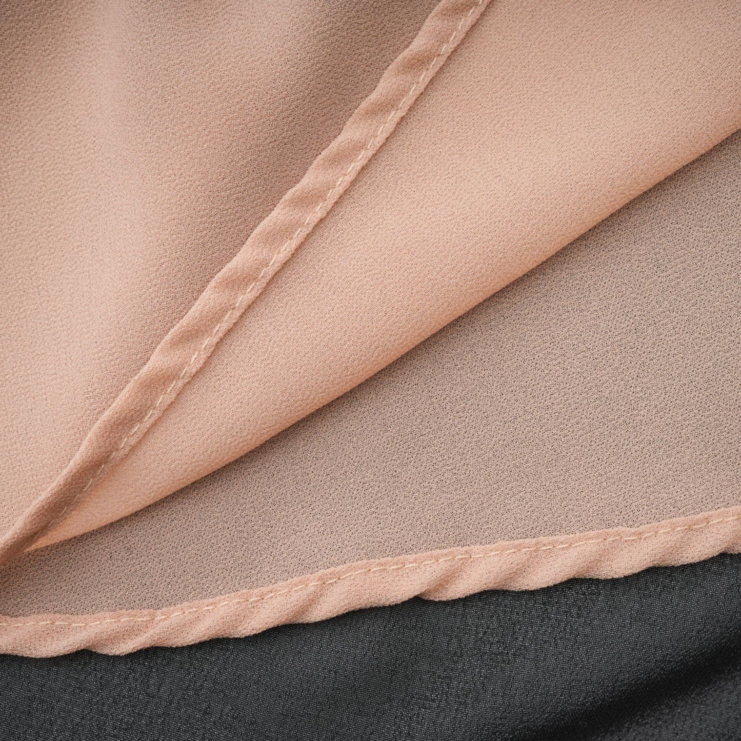 A long flowy maxi skirt with ruffles and pleats made of rayon and tulle fabric in a light color