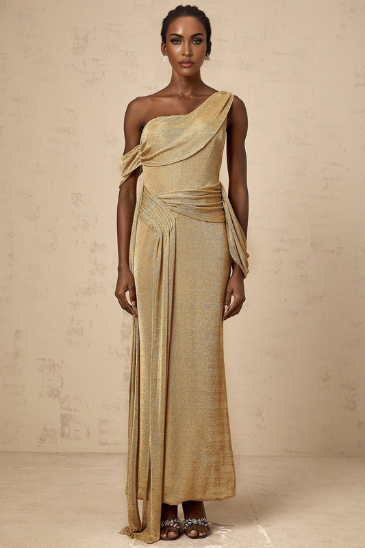 A long golden maxi dress with gathered fabric and decorative ribbon design details named Anne