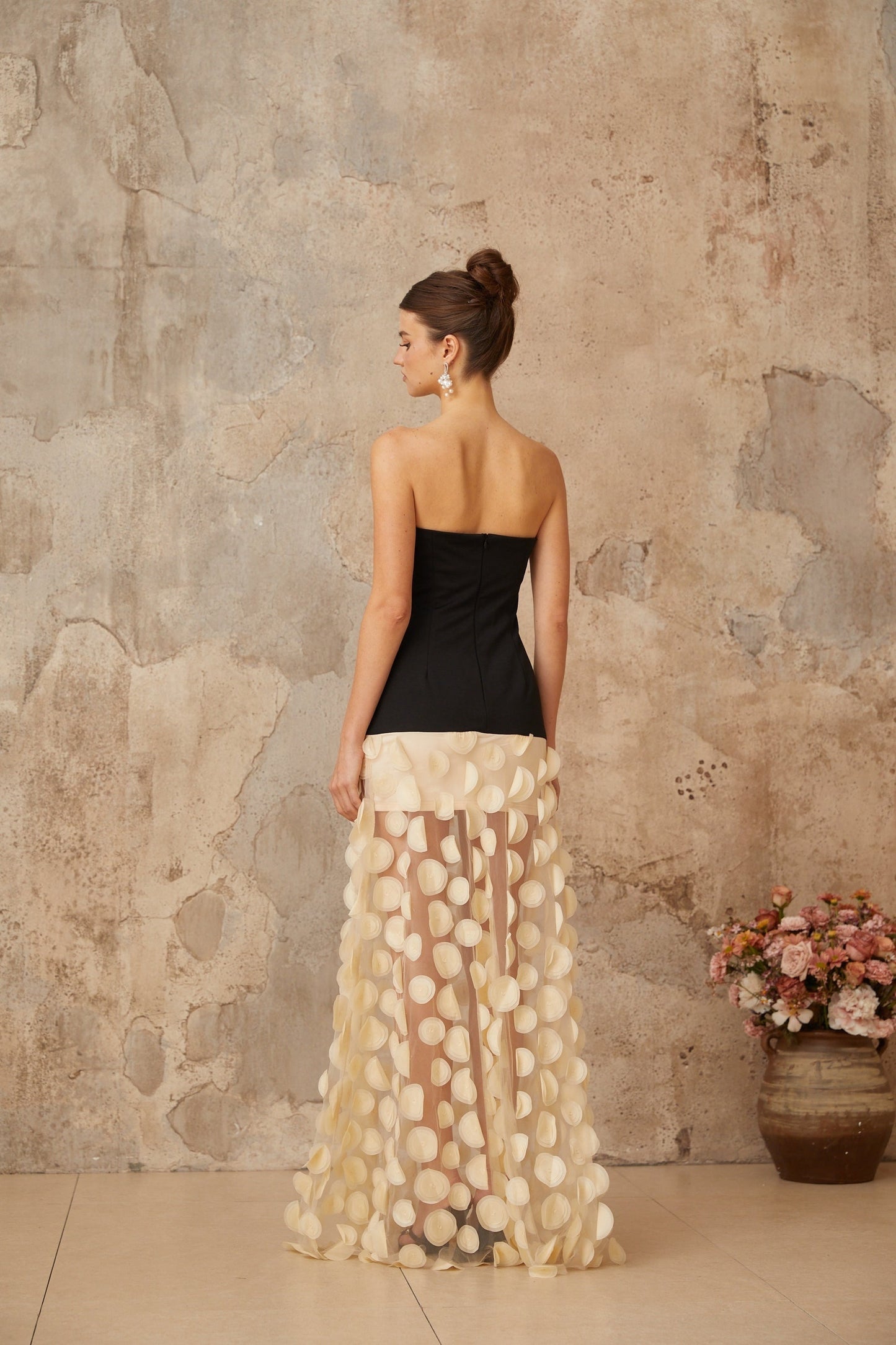 A long maxi dress with contrast colored three dimensional polka dot pattern named Xenia