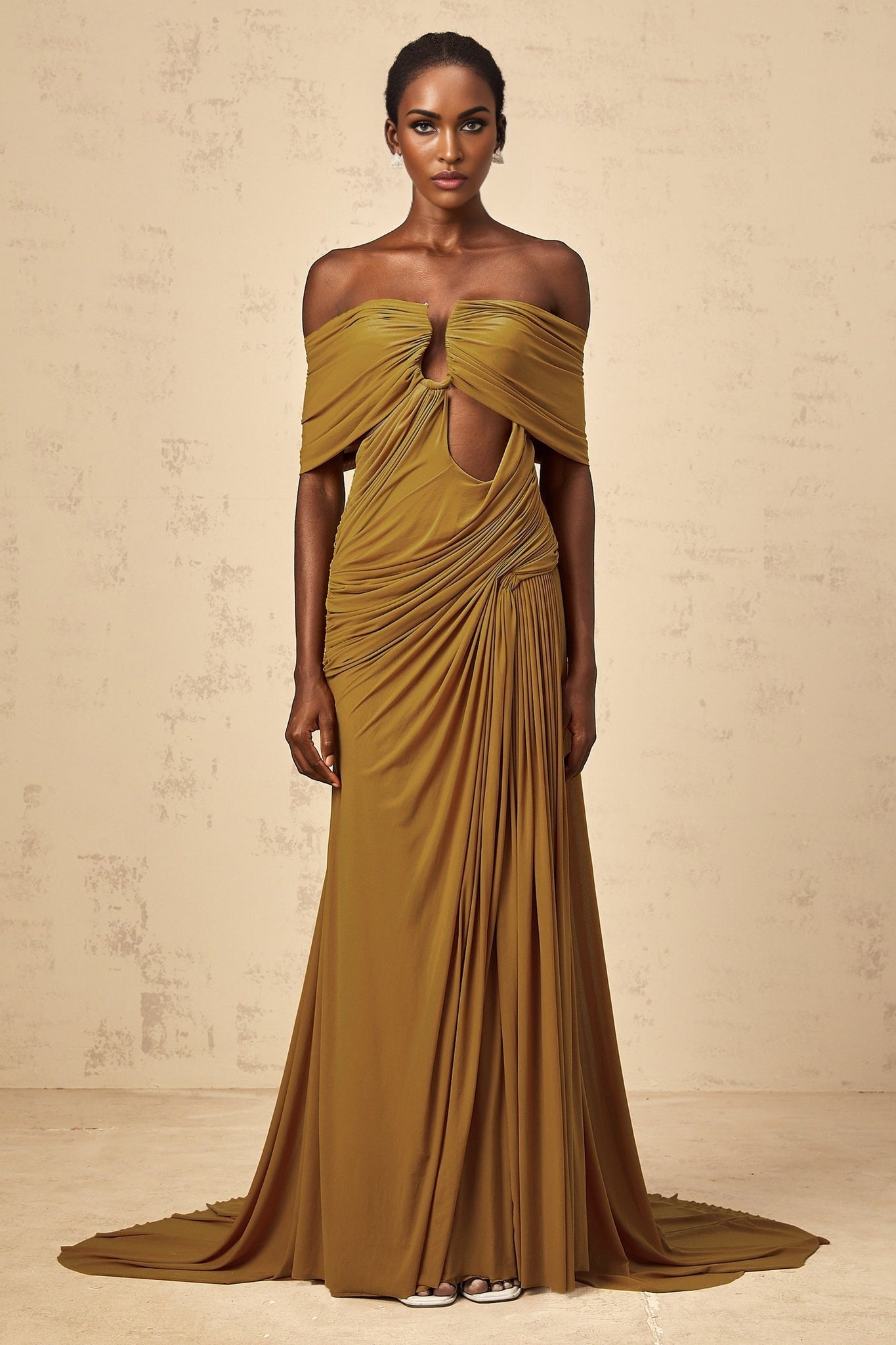 A long ocher maxi dress with offshoulder design featuring cutout details and ruched fabric Ludivine style