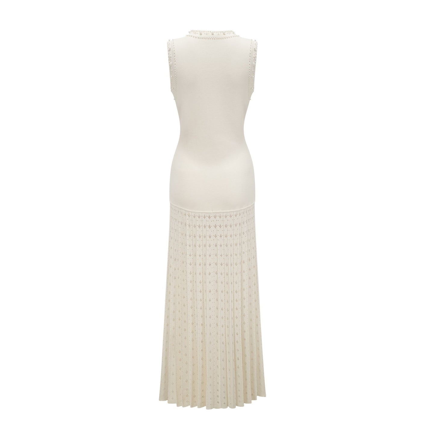 A long white knitted maxi dress with faux pearl embellishments throughout the fabric