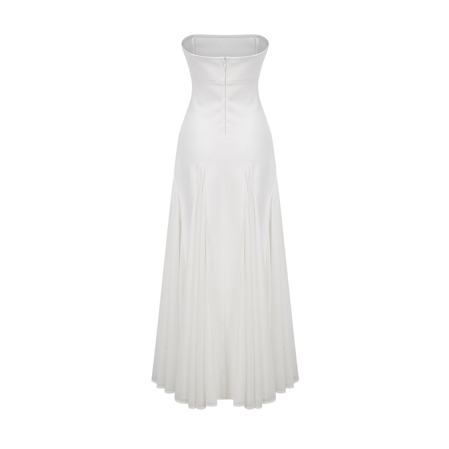 A long white maxi dress with tulle paneling details named Nathalie featuring a flowy silhouette and delicate fabric
