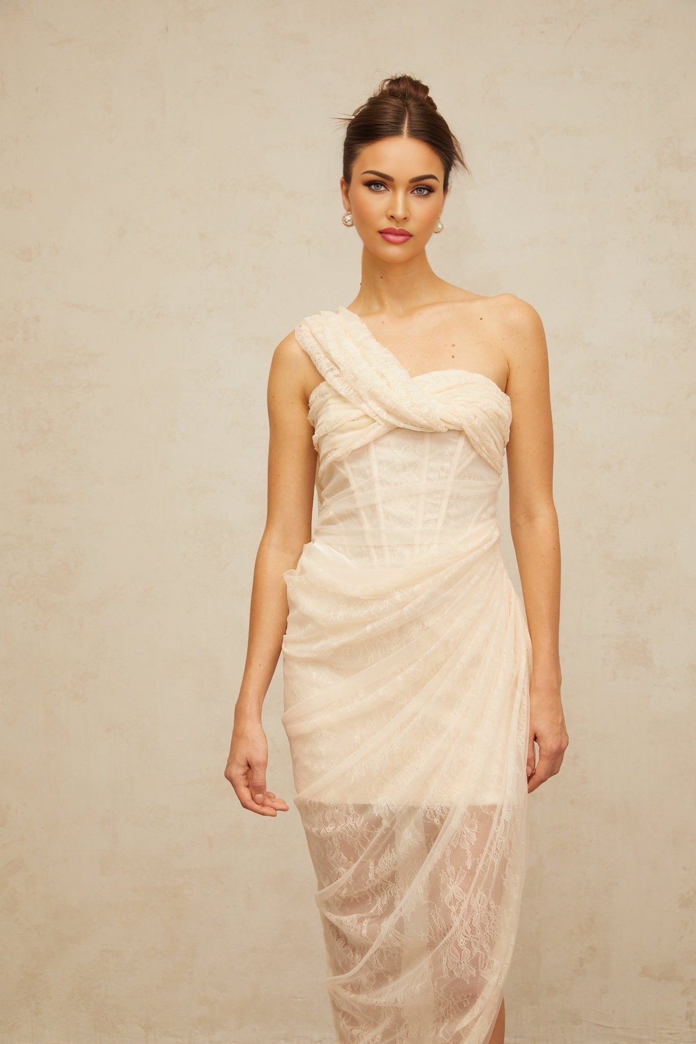 A midi dress with floral lace and gathered tulle panels featuring a petunia design and color scheme