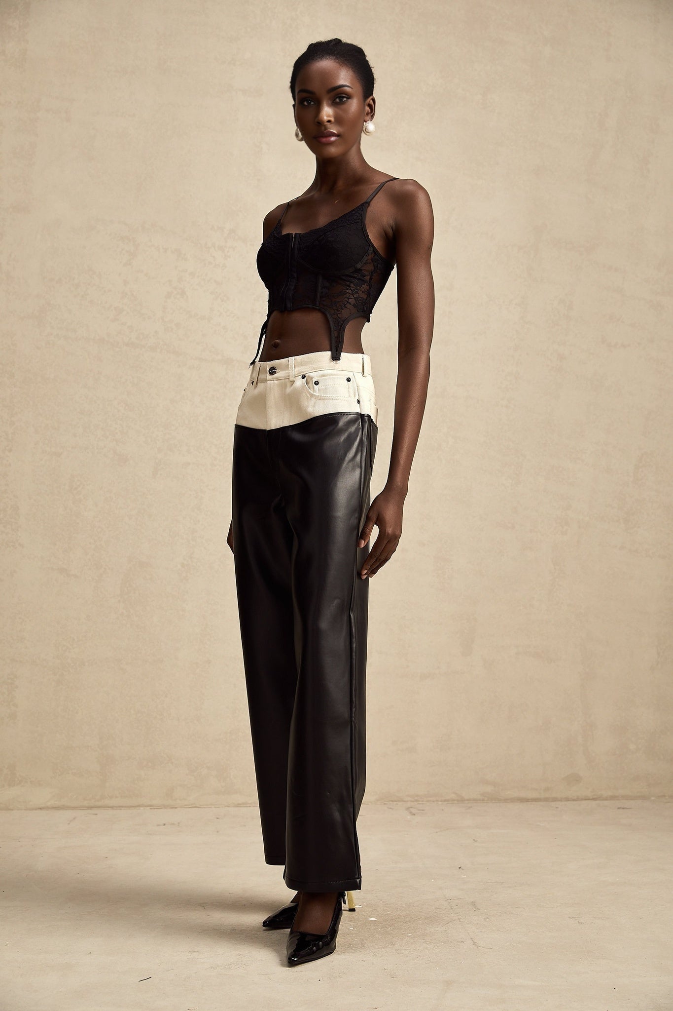 A pair of leather trousers featuring contrasting colors named Clotilde