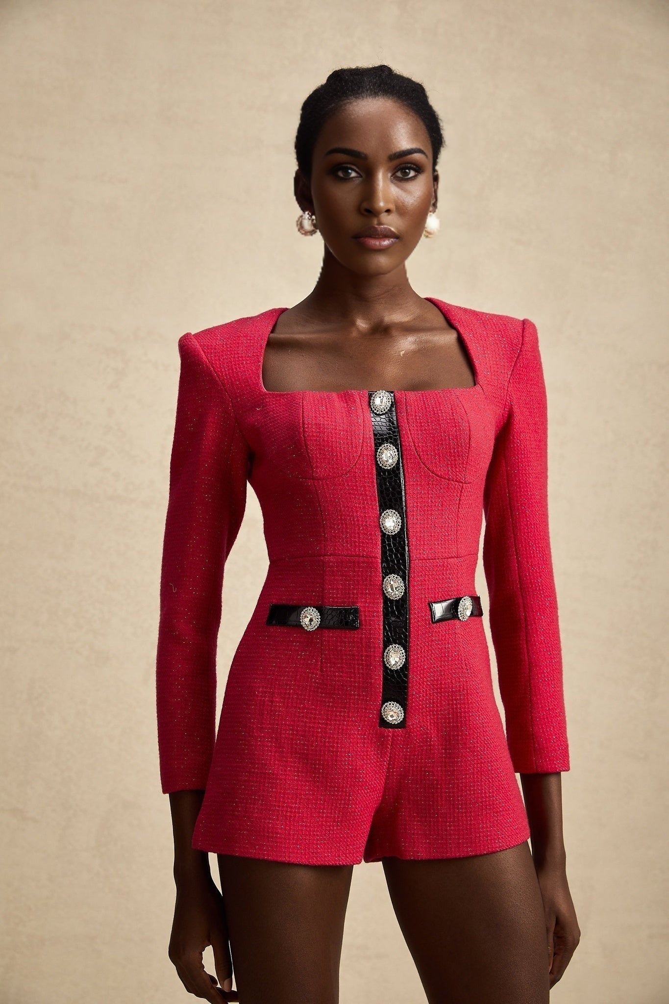 A pink longsleeved bodysuit with cutout details named Celestine