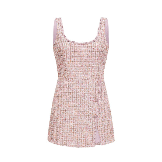 A pink tweed mini dress with embellishments named Aoife featuring a short hemline and decorative details on the fabric