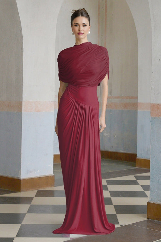 A red asymmetric maxi dress with pleated details and a flowing silhouette named Catherine