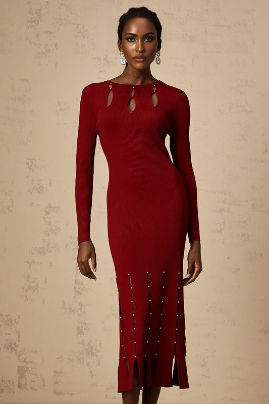 A red knit midi dress with long sleeves and beaded details featuring cutout sections and a form fitting silhouette