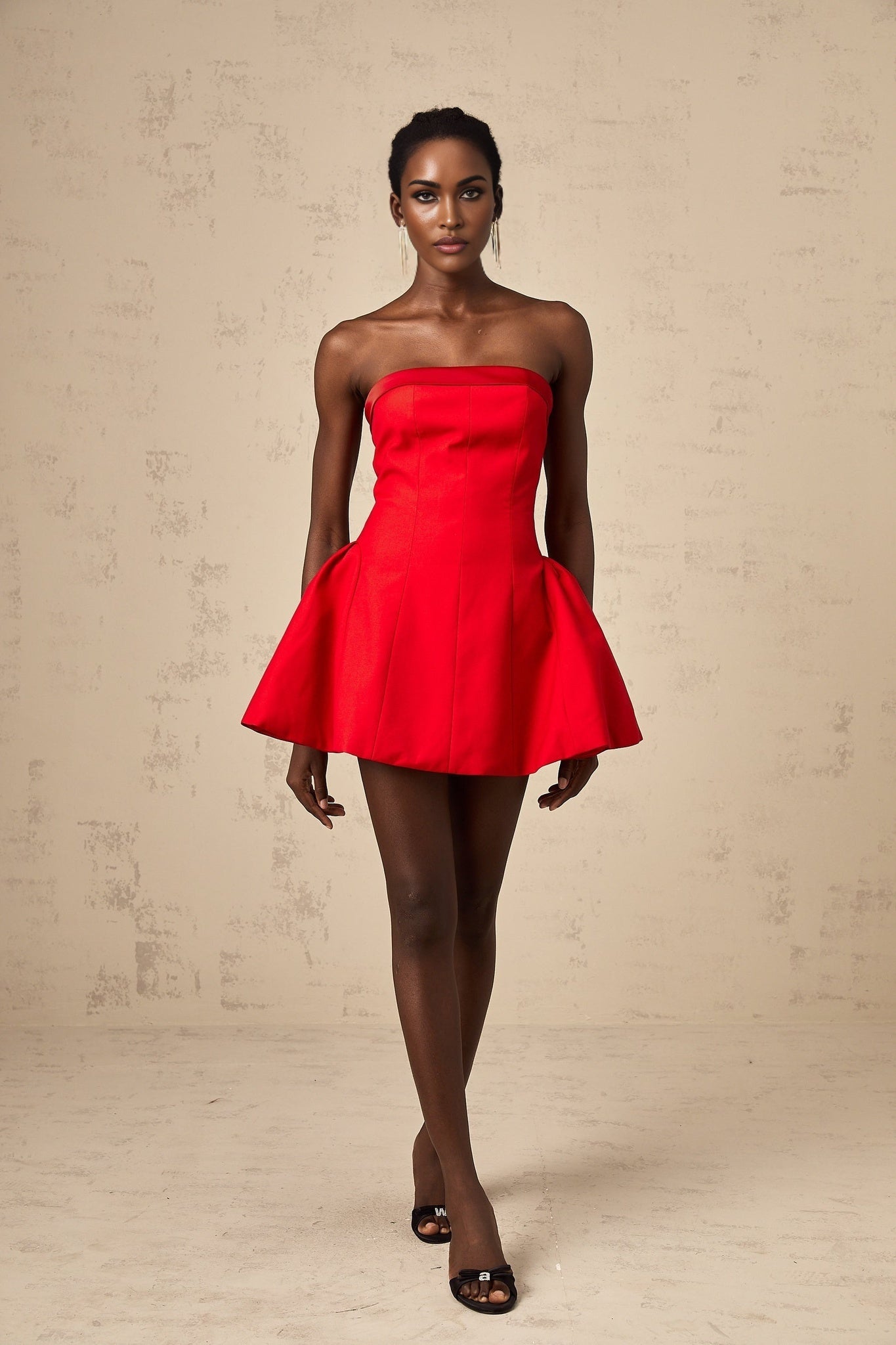 A red offshoulder mini dress with a flared skirt and fitted bodice named Perrine