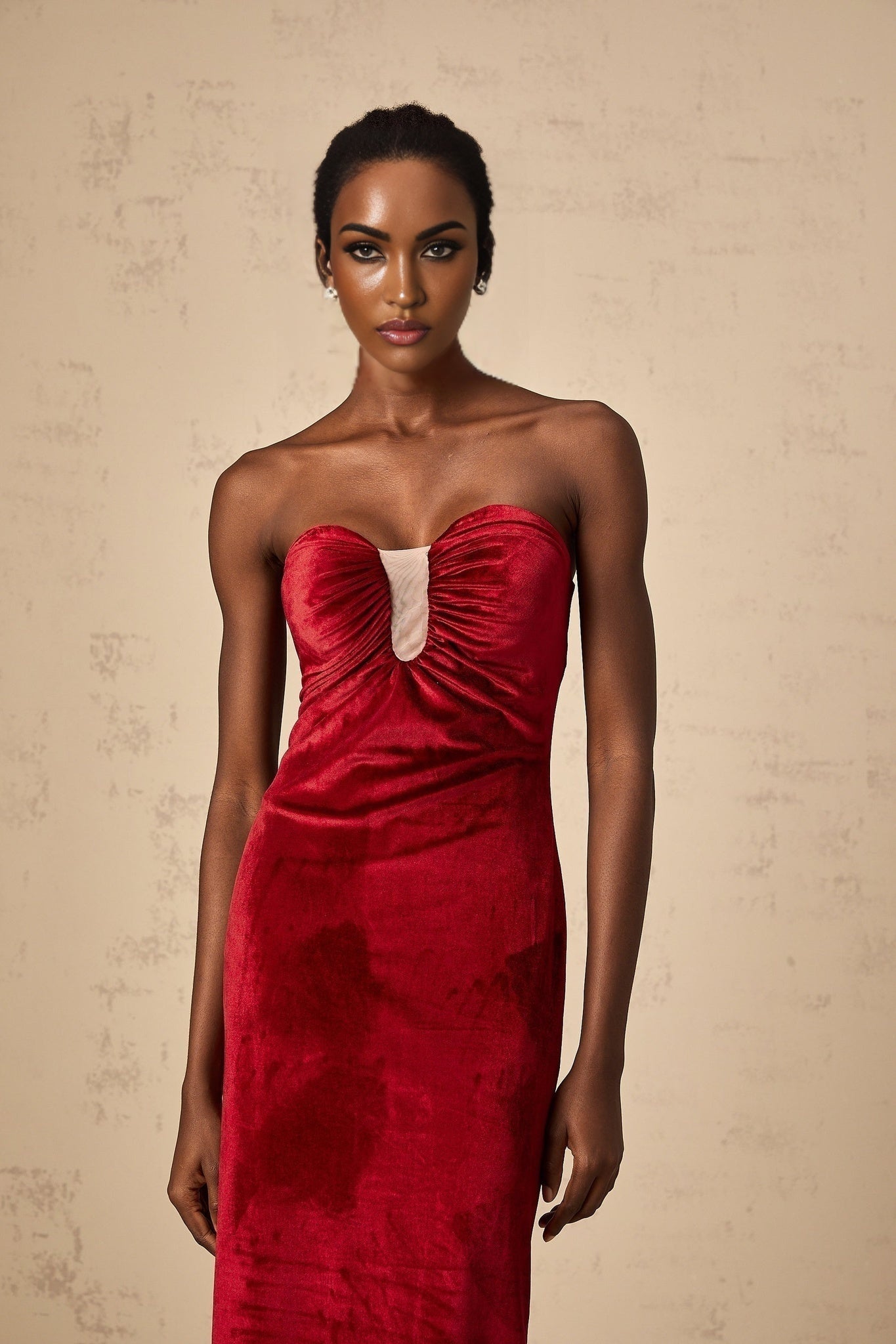 A red velvet midi dress with gathered details named Tiphaine