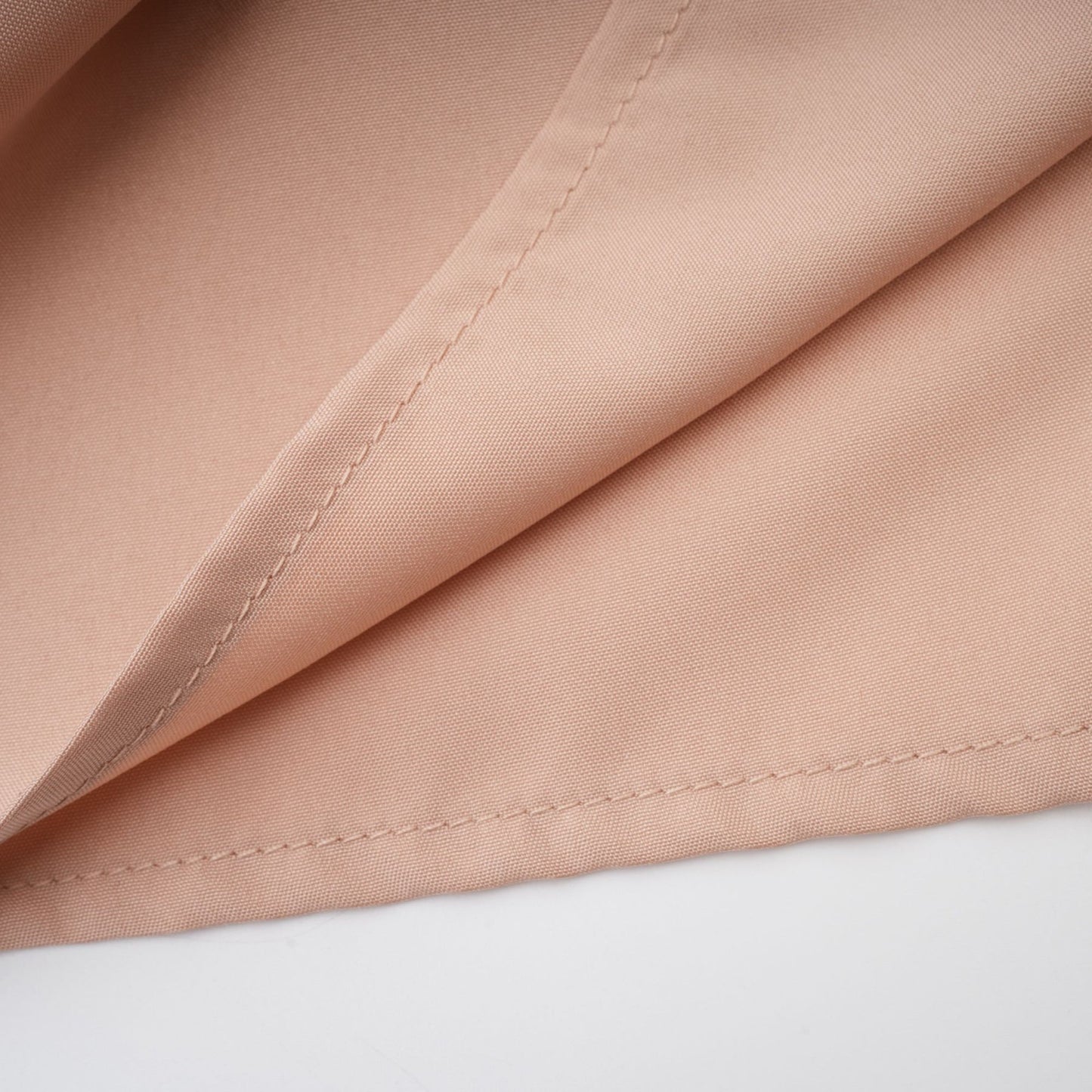 Sleeveless dress in neutrals with crystal embellishment ruched detailing flared skirt and rear zip fastening