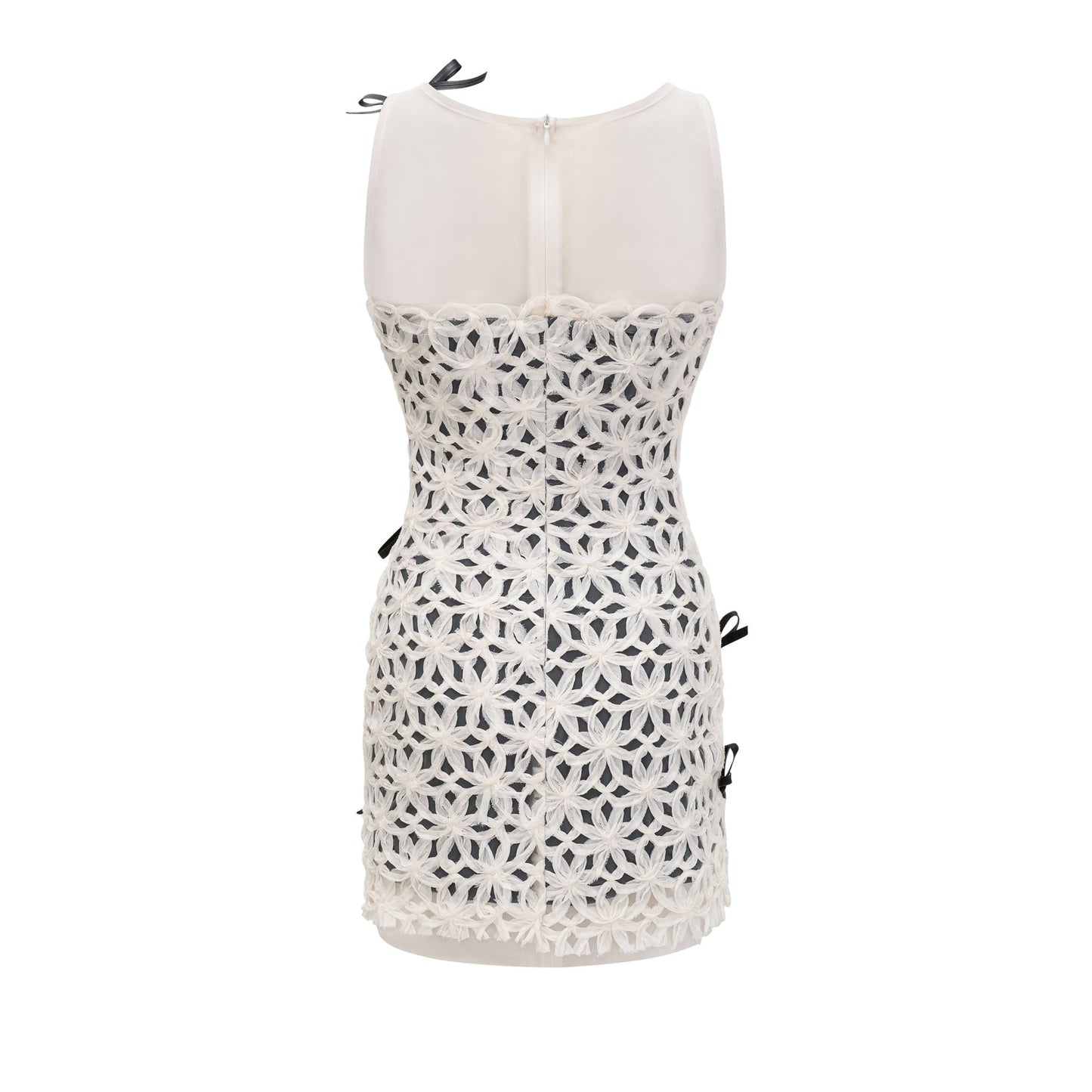 Monochrome sleeveless dress with bow braided pattern and sheer panels featuring a back zipper and thigh length made of 67% cotton and 33% polyester