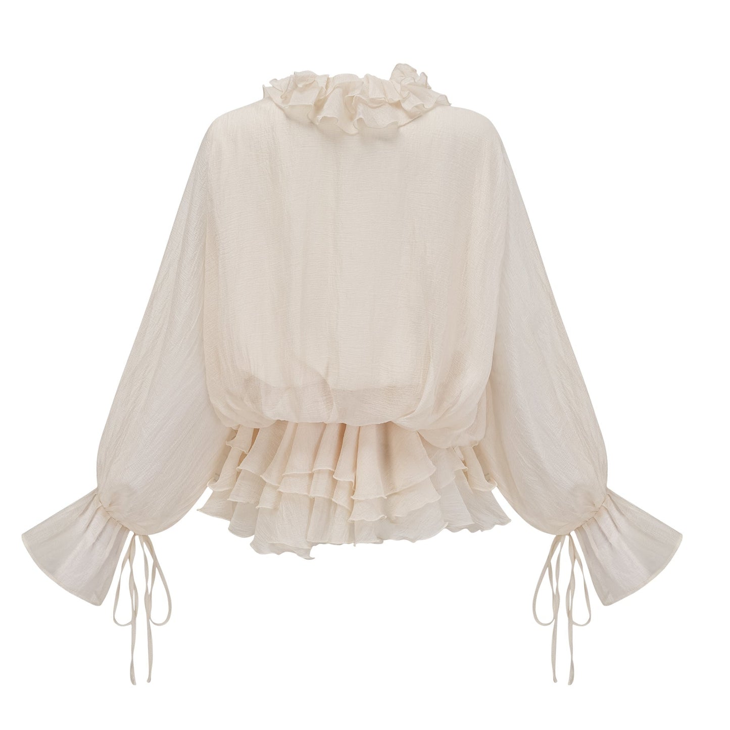 A short tiered mini dress in neutral tones featuring delicate floral appliques throughout the design