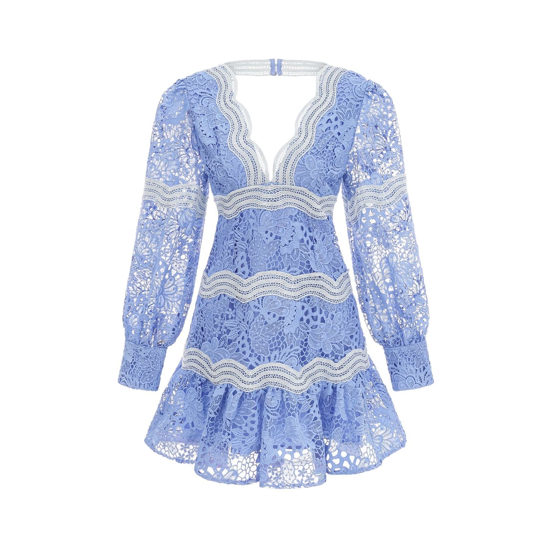 A short white dress with floral embroidery featuring a V neckline and a mini length skirt