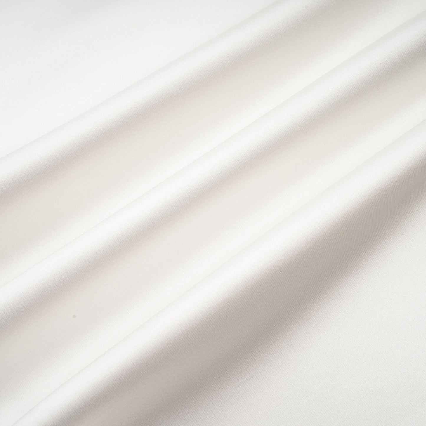 White satin dress with sleeveless design square neck spaghetti straps and an asymmetric hem featuring a rear zip closure Thigh length made of 56% Polyester and 44% Acetate