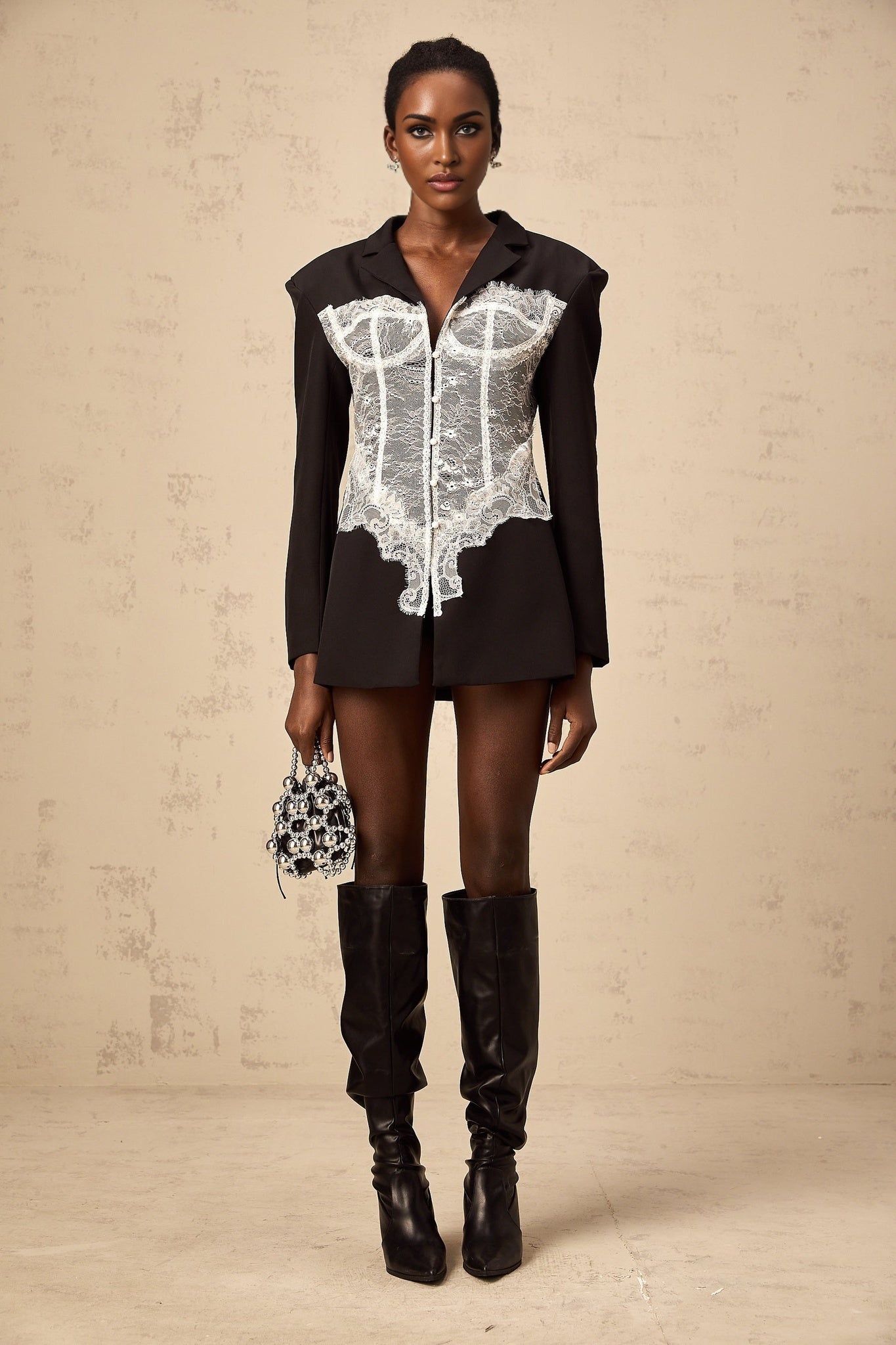 A stylish blazer featuring color blocking and lace panels named Alexia