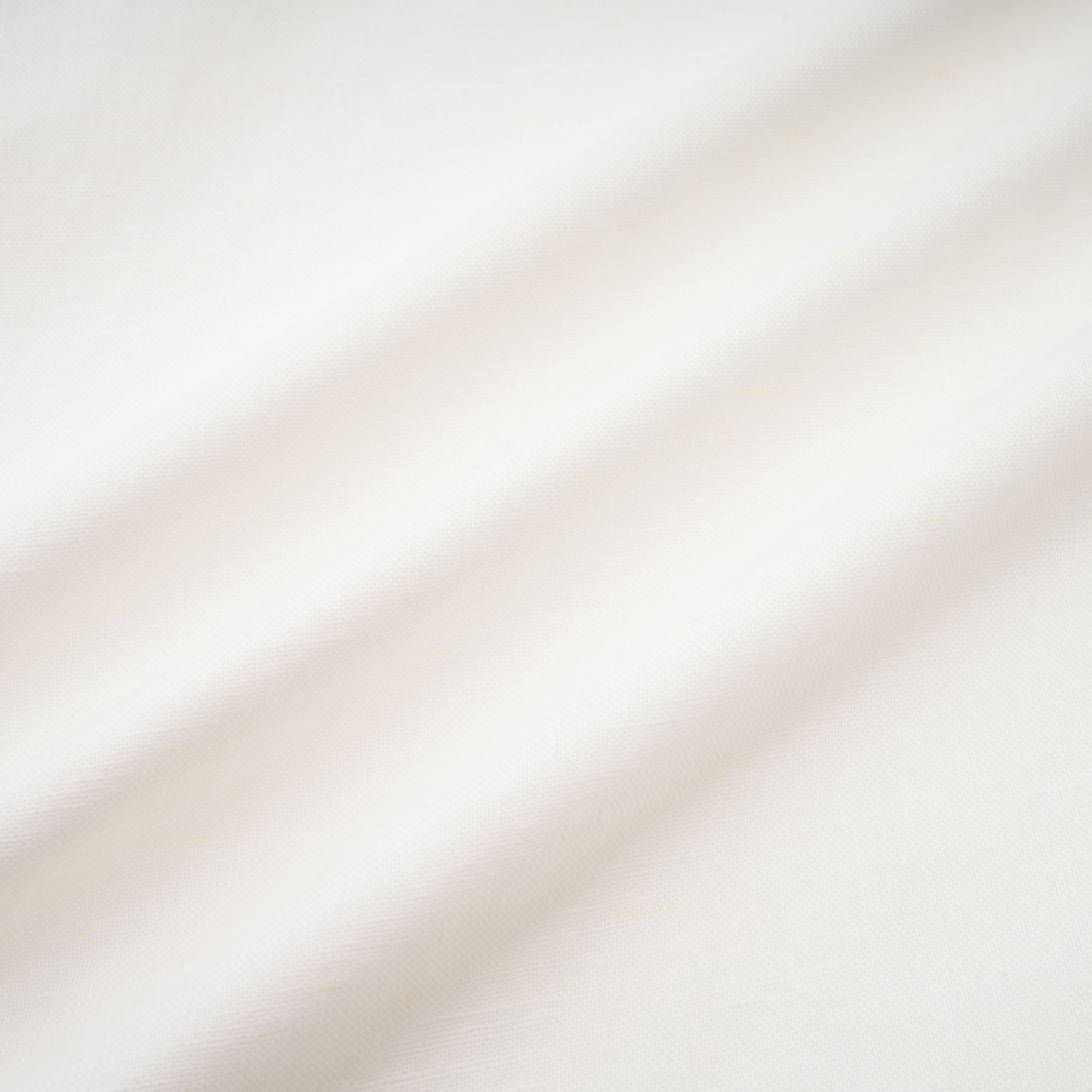 A white corset midi dress with a fitted bodice and flared skirt worn by a model against a plain background