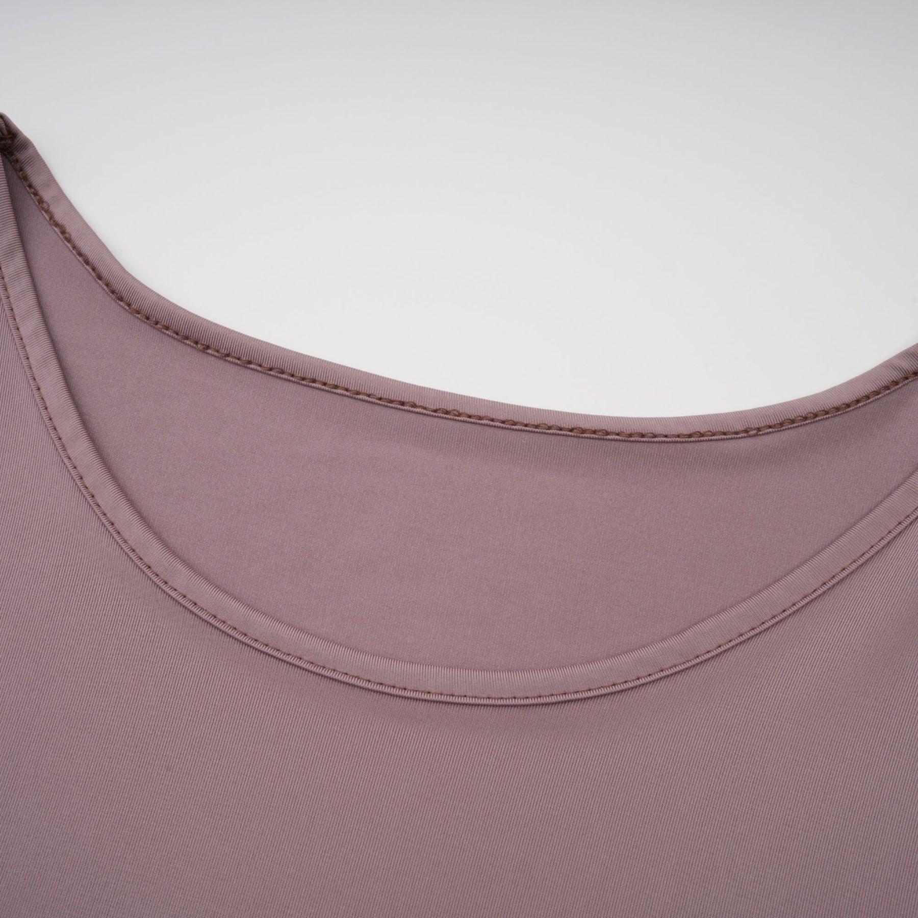 A white lace maxi dress with a wavy pattern named Athena featuring a long flowing design and delicate lace details throughout